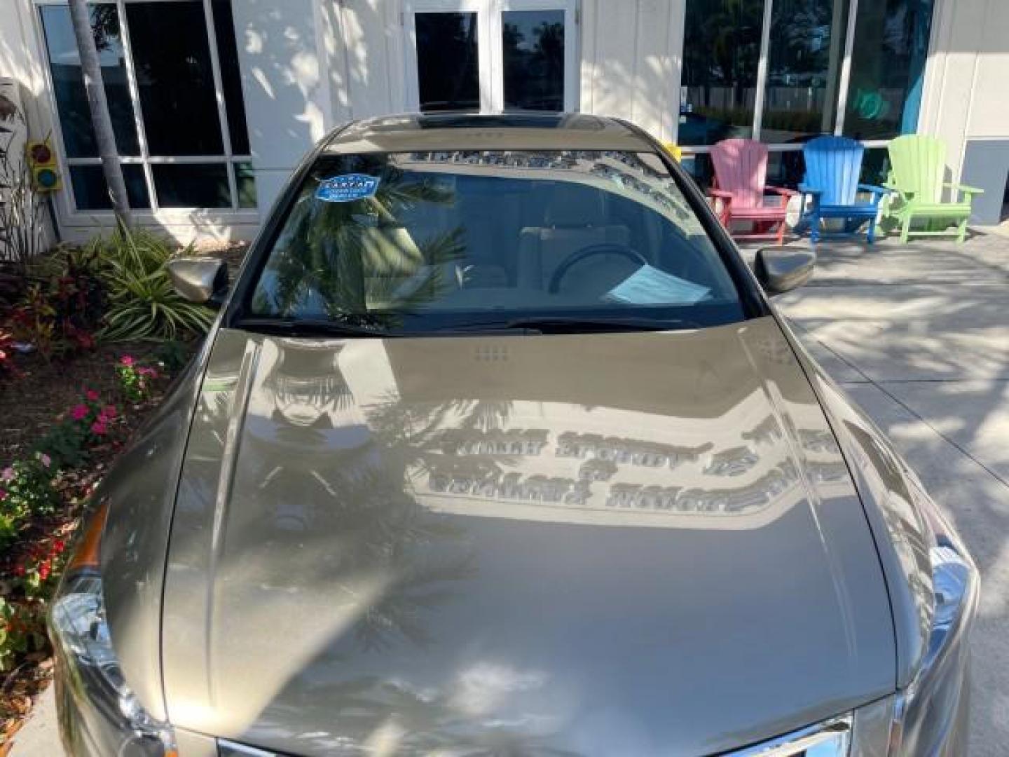 2009 Bold Beige Metallic /Ivory Honda Accord Sdn EX-L LOW MILES 31,501 (1HGCP26819A) with an 2.4L DOHC MPFI 16-Valve i-VTEC I4 Engine engine, Automatic transmission, located at 4701 North Dixie Hwy, Pompano Beach, FL, 33064, (954) 422-2889, 26.240938, -80.123474 - OUR WEBPAGE FLORIDACARS1.COM HAS OVER 100 PHOTOS AND FREE CARFAX LINK 2009 HONDA ACCORD EX-L VIN: 1HGCP26819A145607 1 H G C P 2 6 8 1 9 A 1 4 5 6 0 7 SEDAN 4 DR 2.4L I4 F DOHC 16V 31 MPG GASOLINE FRONT WHEEL DRIVE Top Features Alloy Wheels Satellite Radio Ready Front Seat Heaters Sunroof(s) Leather - Photo#60