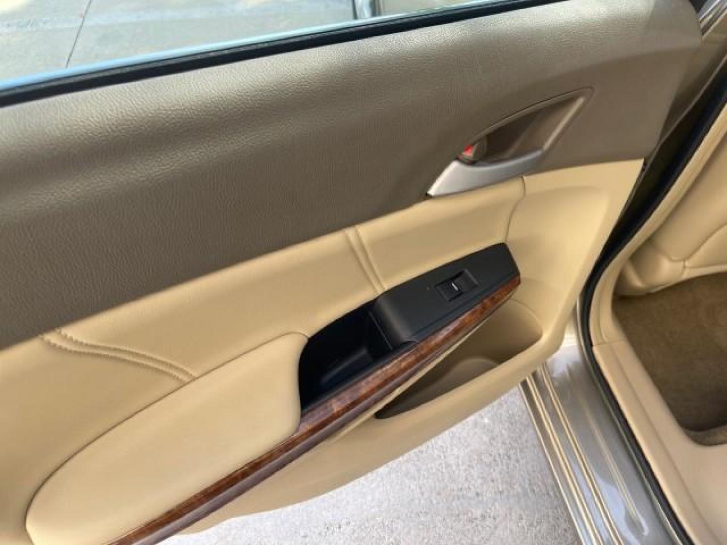 2009 Bold Beige Metallic /Ivory Honda Accord Sdn EX-L LOW MILES 31,501 (1HGCP26819A) with an 2.4L DOHC MPFI 16-Valve i-VTEC I4 Engine engine, Automatic transmission, located at 4701 North Dixie Hwy, Pompano Beach, FL, 33064, (954) 422-2889, 26.240938, -80.123474 - OUR WEBPAGE FLORIDACARS1.COM HAS OVER 100 PHOTOS AND FREE CARFAX LINK 2009 HONDA ACCORD EX-L VIN: 1HGCP26819A145607 1 H G C P 2 6 8 1 9 A 1 4 5 6 0 7 SEDAN 4 DR 2.4L I4 F DOHC 16V 31 MPG GASOLINE FRONT WHEEL DRIVE Top Features Alloy Wheels Satellite Radio Ready Front Seat Heaters Sunroof(s) Leather - Photo#63