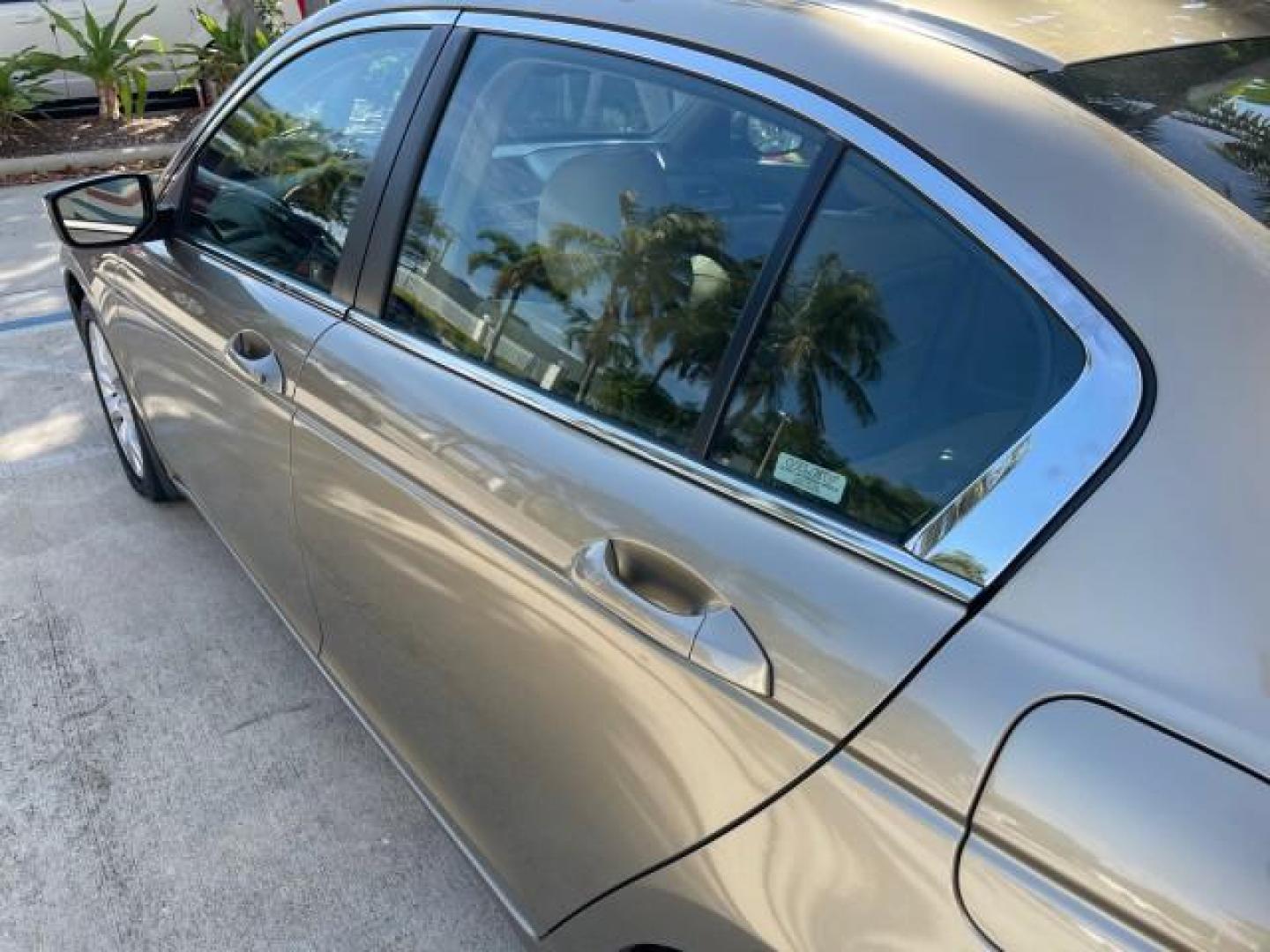 2009 Bold Beige Metallic /Ivory Honda Accord Sdn EX-L LOW MILES 31,501 (1HGCP26819A) with an 2.4L DOHC MPFI 16-Valve i-VTEC I4 Engine engine, Automatic transmission, located at 4701 North Dixie Hwy, Pompano Beach, FL, 33064, (954) 422-2889, 26.240938, -80.123474 - OUR WEBPAGE FLORIDACARS1.COM HAS OVER 100 PHOTOS AND FREE CARFAX LINK 2009 HONDA ACCORD EX-L VIN: 1HGCP26819A145607 1 H G C P 2 6 8 1 9 A 1 4 5 6 0 7 SEDAN 4 DR 2.4L I4 F DOHC 16V 31 MPG GASOLINE FRONT WHEEL DRIVE Top Features Alloy Wheels Satellite Radio Ready Front Seat Heaters Sunroof(s) Leather - Photo#66
