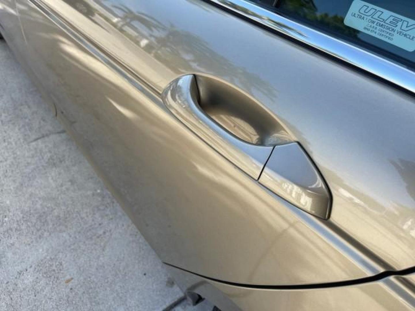 2009 Bold Beige Metallic /Ivory Honda Accord Sdn EX-L LOW MILES 31,501 (1HGCP26819A) with an 2.4L DOHC MPFI 16-Valve i-VTEC I4 Engine engine, Automatic transmission, located at 4701 North Dixie Hwy, Pompano Beach, FL, 33064, (954) 422-2889, 26.240938, -80.123474 - OUR WEBPAGE FLORIDACARS1.COM HAS OVER 100 PHOTOS AND FREE CARFAX LINK 2009 HONDA ACCORD EX-L VIN: 1HGCP26819A145607 1 H G C P 2 6 8 1 9 A 1 4 5 6 0 7 SEDAN 4 DR 2.4L I4 F DOHC 16V 31 MPG GASOLINE FRONT WHEEL DRIVE Top Features Alloy Wheels Satellite Radio Ready Front Seat Heaters Sunroof(s) Leather - Photo#67