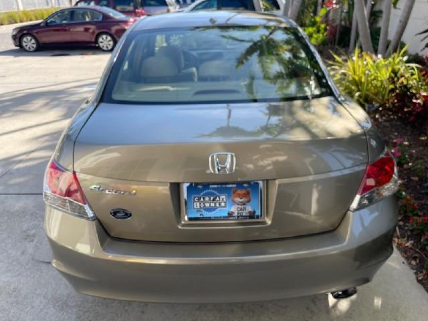 2009 Bold Beige Metallic /Ivory Honda Accord Sdn EX-L LOW MILES 31,501 (1HGCP26819A) with an 2.4L DOHC MPFI 16-Valve i-VTEC I4 Engine engine, Automatic transmission, located at 4701 North Dixie Hwy, Pompano Beach, FL, 33064, (954) 422-2889, 26.240938, -80.123474 - OUR WEBPAGE FLORIDACARS1.COM HAS OVER 100 PHOTOS AND FREE CARFAX LINK 2009 HONDA ACCORD EX-L VIN: 1HGCP26819A145607 1 H G C P 2 6 8 1 9 A 1 4 5 6 0 7 SEDAN 4 DR 2.4L I4 F DOHC 16V 31 MPG GASOLINE FRONT WHEEL DRIVE Top Features Alloy Wheels Satellite Radio Ready Front Seat Heaters Sunroof(s) Leather - Photo#6
