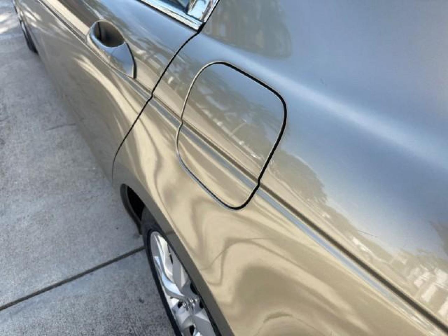 2009 Bold Beige Metallic /Ivory Honda Accord Sdn EX-L LOW MILES 31,501 (1HGCP26819A) with an 2.4L DOHC MPFI 16-Valve i-VTEC I4 Engine engine, Automatic transmission, located at 4701 North Dixie Hwy, Pompano Beach, FL, 33064, (954) 422-2889, 26.240938, -80.123474 - OUR WEBPAGE FLORIDACARS1.COM HAS OVER 100 PHOTOS AND FREE CARFAX LINK 2009 HONDA ACCORD EX-L VIN: 1HGCP26819A145607 1 H G C P 2 6 8 1 9 A 1 4 5 6 0 7 SEDAN 4 DR 2.4L I4 F DOHC 16V 31 MPG GASOLINE FRONT WHEEL DRIVE Top Features Alloy Wheels Satellite Radio Ready Front Seat Heaters Sunroof(s) Leather - Photo#75