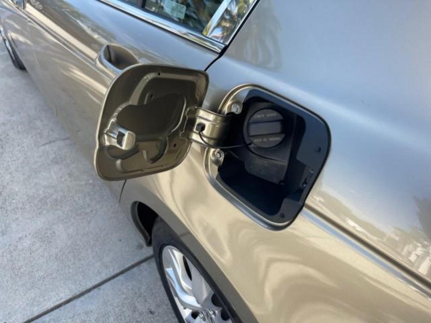 2009 Bold Beige Metallic /Ivory Honda Accord Sdn EX-L LOW MILES 31,501 (1HGCP26819A) with an 2.4L DOHC MPFI 16-Valve i-VTEC I4 Engine engine, Automatic transmission, located at 4701 North Dixie Hwy, Pompano Beach, FL, 33064, (954) 422-2889, 26.240938, -80.123474 - OUR WEBPAGE FLORIDACARS1.COM HAS OVER 100 PHOTOS AND FREE CARFAX LINK 2009 HONDA ACCORD EX-L VIN: 1HGCP26819A145607 1 H G C P 2 6 8 1 9 A 1 4 5 6 0 7 SEDAN 4 DR 2.4L I4 F DOHC 16V 31 MPG GASOLINE FRONT WHEEL DRIVE Top Features Alloy Wheels Satellite Radio Ready Front Seat Heaters Sunroof(s) Leather - Photo#76