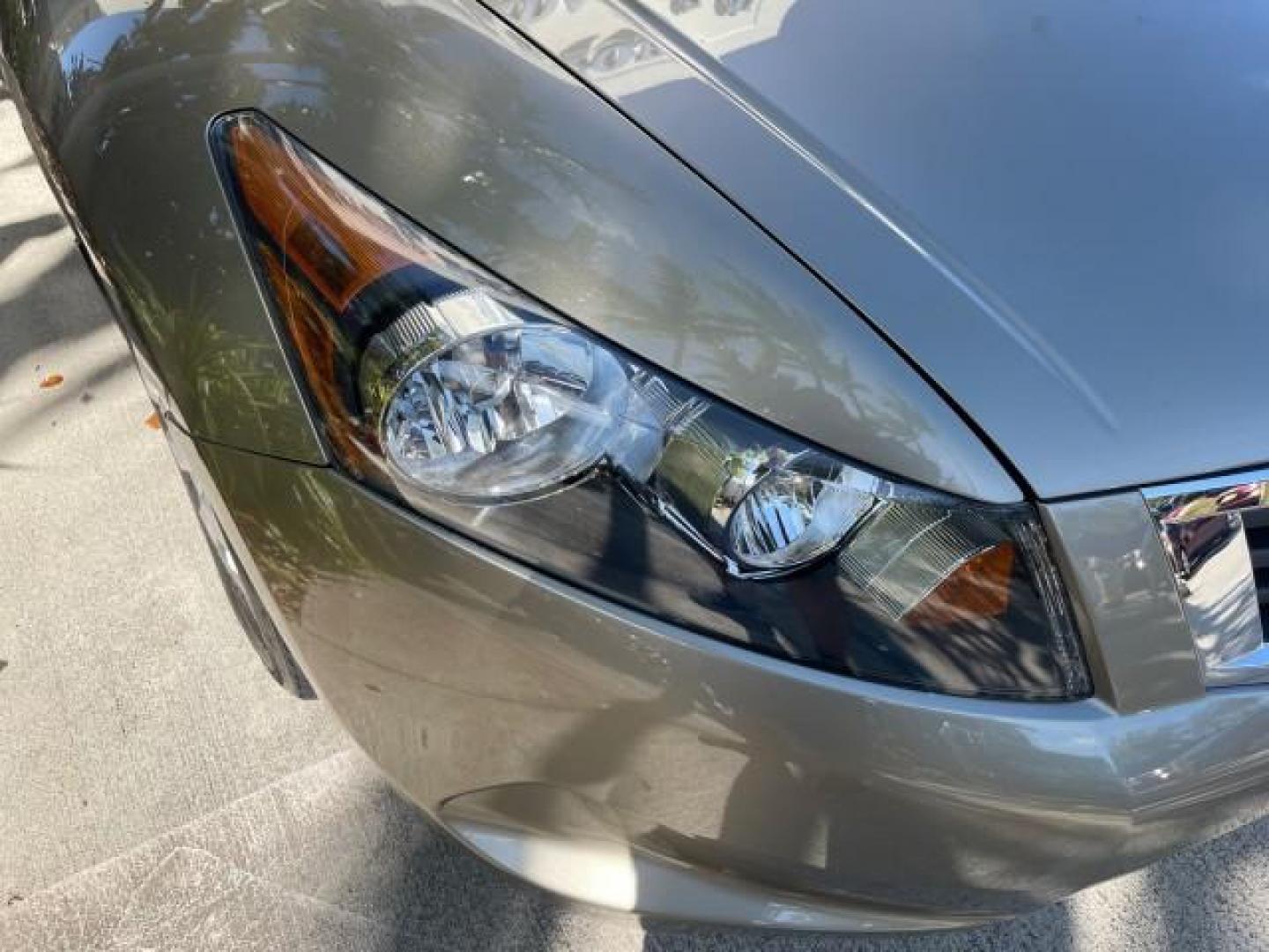 2009 Bold Beige Metallic /Ivory Honda Accord Sdn EX-L LOW MILES 31,501 (1HGCP26819A) with an 2.4L DOHC MPFI 16-Valve i-VTEC I4 Engine engine, Automatic transmission, located at 4701 North Dixie Hwy, Pompano Beach, FL, 33064, (954) 422-2889, 26.240938, -80.123474 - OUR WEBPAGE FLORIDACARS1.COM HAS OVER 100 PHOTOS AND FREE CARFAX LINK 2009 HONDA ACCORD EX-L VIN: 1HGCP26819A145607 1 H G C P 2 6 8 1 9 A 1 4 5 6 0 7 SEDAN 4 DR 2.4L I4 F DOHC 16V 31 MPG GASOLINE FRONT WHEEL DRIVE Top Features Alloy Wheels Satellite Radio Ready Front Seat Heaters Sunroof(s) Leather - Photo#77