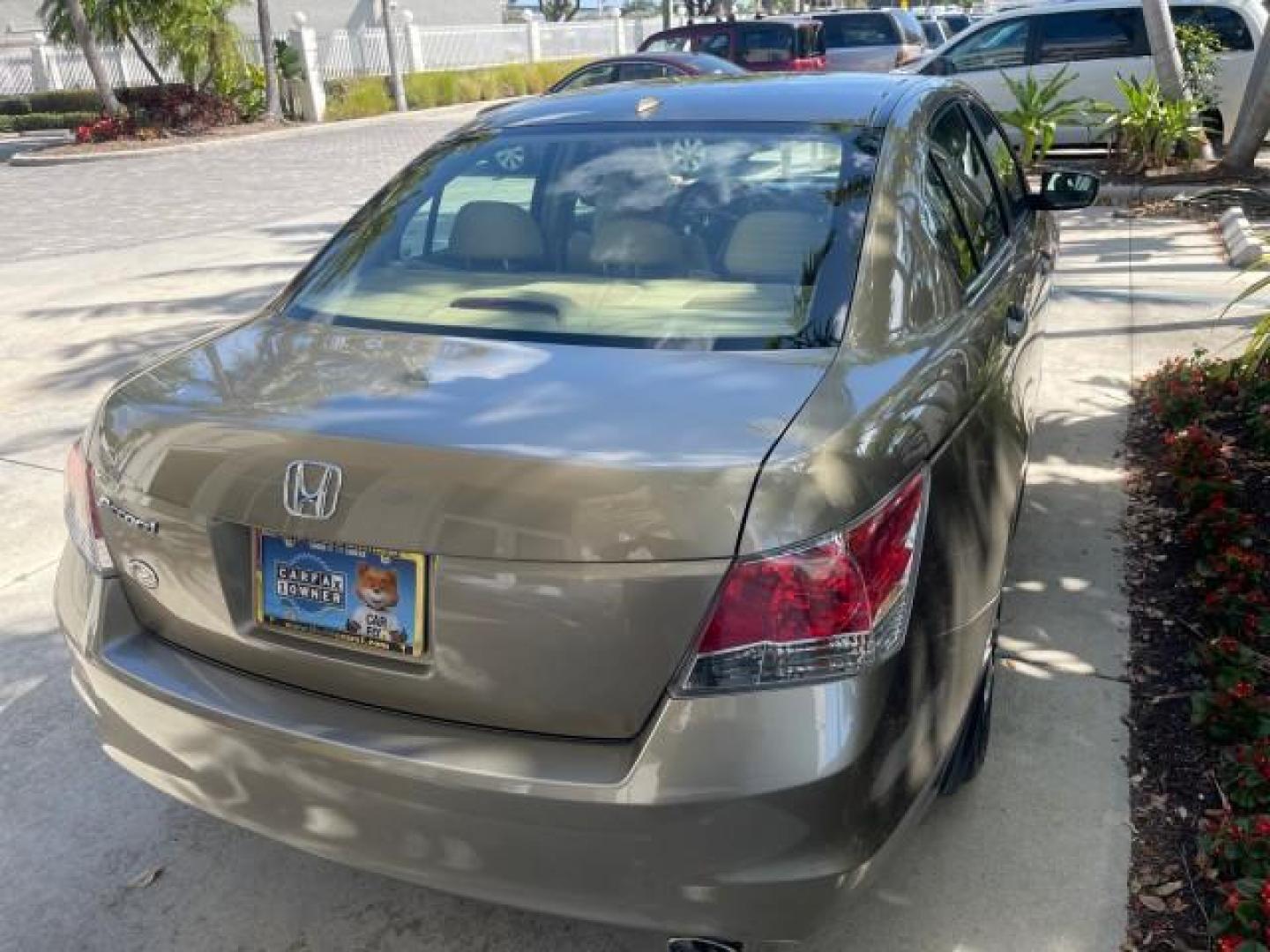 2009 Bold Beige Metallic /Ivory Honda Accord Sdn EX-L LOW MILES 31,501 (1HGCP26819A) with an 2.4L DOHC MPFI 16-Valve i-VTEC I4 Engine engine, Automatic transmission, located at 4701 North Dixie Hwy, Pompano Beach, FL, 33064, (954) 422-2889, 26.240938, -80.123474 - OUR WEBPAGE FLORIDACARS1.COM HAS OVER 100 PHOTOS AND FREE CARFAX LINK 2009 HONDA ACCORD EX-L VIN: 1HGCP26819A145607 1 H G C P 2 6 8 1 9 A 1 4 5 6 0 7 SEDAN 4 DR 2.4L I4 F DOHC 16V 31 MPG GASOLINE FRONT WHEEL DRIVE Top Features Alloy Wheels Satellite Radio Ready Front Seat Heaters Sunroof(s) Leather - Photo#7