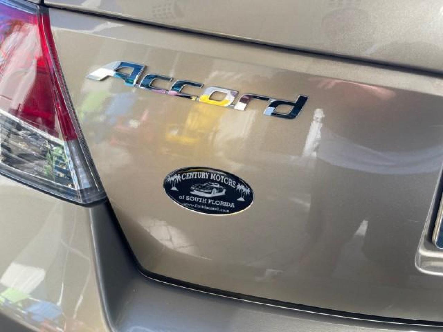 2009 Bold Beige Metallic /Ivory Honda Accord Sdn EX-L LOW MILES 31,501 (1HGCP26819A) with an 2.4L DOHC MPFI 16-Valve i-VTEC I4 Engine engine, Automatic transmission, located at 4701 North Dixie Hwy, Pompano Beach, FL, 33064, (954) 422-2889, 26.240938, -80.123474 - OUR WEBPAGE FLORIDACARS1.COM HAS OVER 100 PHOTOS AND FREE CARFAX LINK 2009 HONDA ACCORD EX-L VIN: 1HGCP26819A145607 1 H G C P 2 6 8 1 9 A 1 4 5 6 0 7 SEDAN 4 DR 2.4L I4 F DOHC 16V 31 MPG GASOLINE FRONT WHEEL DRIVE Top Features Alloy Wheels Satellite Radio Ready Front Seat Heaters Sunroof(s) Leather - Photo#81