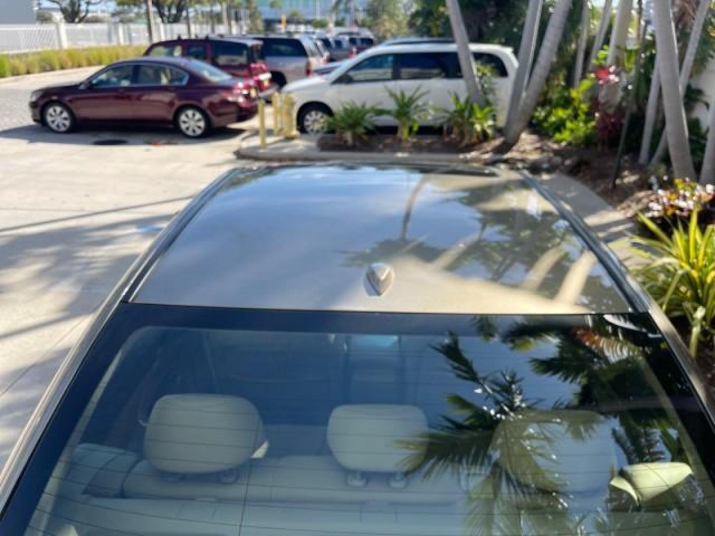 2009 Bold Beige Metallic /Ivory Honda Accord Sdn EX-L LOW MILES 31,501 (1HGCP26819A) with an 2.4L DOHC MPFI 16-Valve i-VTEC I4 Engine engine, Automatic transmission, located at 4701 North Dixie Hwy, Pompano Beach, FL, 33064, (954) 422-2889, 26.240938, -80.123474 - OUR WEBPAGE FLORIDACARS1.COM HAS OVER 100 PHOTOS AND FREE CARFAX LINK 2009 HONDA ACCORD EX-L VIN: 1HGCP26819A145607 1 H G C P 2 6 8 1 9 A 1 4 5 6 0 7 SEDAN 4 DR 2.4L I4 F DOHC 16V 31 MPG GASOLINE FRONT WHEEL DRIVE Top Features Alloy Wheels Satellite Radio Ready Front Seat Heaters Sunroof(s) Leather - Photo#83