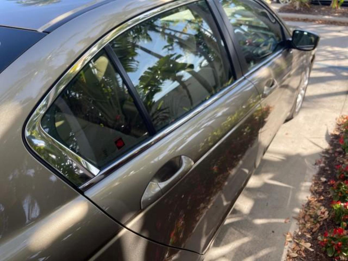 2009 Bold Beige Metallic /Ivory Honda Accord Sdn EX-L LOW MILES 31,501 (1HGCP26819A) with an 2.4L DOHC MPFI 16-Valve i-VTEC I4 Engine engine, Automatic transmission, located at 4701 North Dixie Hwy, Pompano Beach, FL, 33064, (954) 422-2889, 26.240938, -80.123474 - OUR WEBPAGE FLORIDACARS1.COM HAS OVER 100 PHOTOS AND FREE CARFAX LINK 2009 HONDA ACCORD EX-L VIN: 1HGCP26819A145607 1 H G C P 2 6 8 1 9 A 1 4 5 6 0 7 SEDAN 4 DR 2.4L I4 F DOHC 16V 31 MPG GASOLINE FRONT WHEEL DRIVE Top Features Alloy Wheels Satellite Radio Ready Front Seat Heaters Sunroof(s) Leather - Photo#86