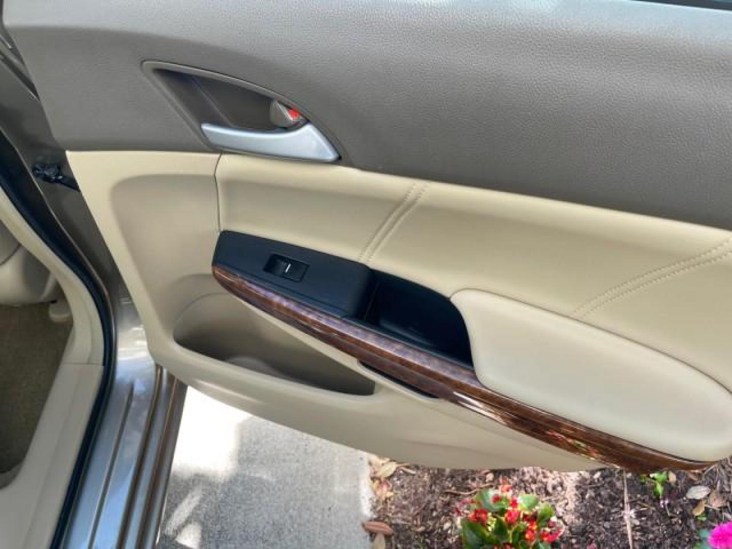 2009 Bold Beige Metallic /Ivory Honda Accord Sdn EX-L LOW MILES 31,501 (1HGCP26819A) with an 2.4L DOHC MPFI 16-Valve i-VTEC I4 Engine engine, Automatic transmission, located at 4701 North Dixie Hwy, Pompano Beach, FL, 33064, (954) 422-2889, 26.240938, -80.123474 - OUR WEBPAGE FLORIDACARS1.COM HAS OVER 100 PHOTOS AND FREE CARFAX LINK 2009 HONDA ACCORD EX-L VIN: 1HGCP26819A145607 1 H G C P 2 6 8 1 9 A 1 4 5 6 0 7 SEDAN 4 DR 2.4L I4 F DOHC 16V 31 MPG GASOLINE FRONT WHEEL DRIVE Top Features Alloy Wheels Satellite Radio Ready Front Seat Heaters Sunroof(s) Leather - Photo#89