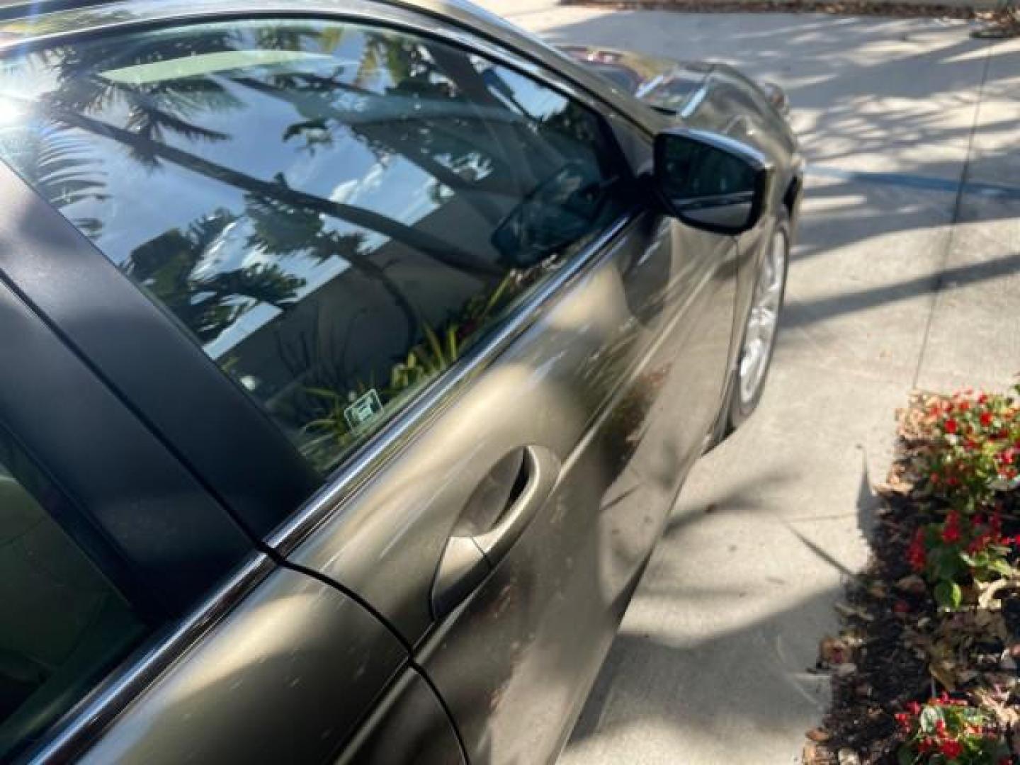 2009 Bold Beige Metallic /Ivory Honda Accord Sdn EX-L LOW MILES 31,501 (1HGCP26819A) with an 2.4L DOHC MPFI 16-Valve i-VTEC I4 Engine engine, Automatic transmission, located at 4701 North Dixie Hwy, Pompano Beach, FL, 33064, (954) 422-2889, 26.240938, -80.123474 - OUR WEBPAGE FLORIDACARS1.COM HAS OVER 100 PHOTOS AND FREE CARFAX LINK 2009 HONDA ACCORD EX-L VIN: 1HGCP26819A145607 1 H G C P 2 6 8 1 9 A 1 4 5 6 0 7 SEDAN 4 DR 2.4L I4 F DOHC 16V 31 MPG GASOLINE FRONT WHEEL DRIVE Top Features Alloy Wheels Satellite Radio Ready Front Seat Heaters Sunroof(s) Leather - Photo#92