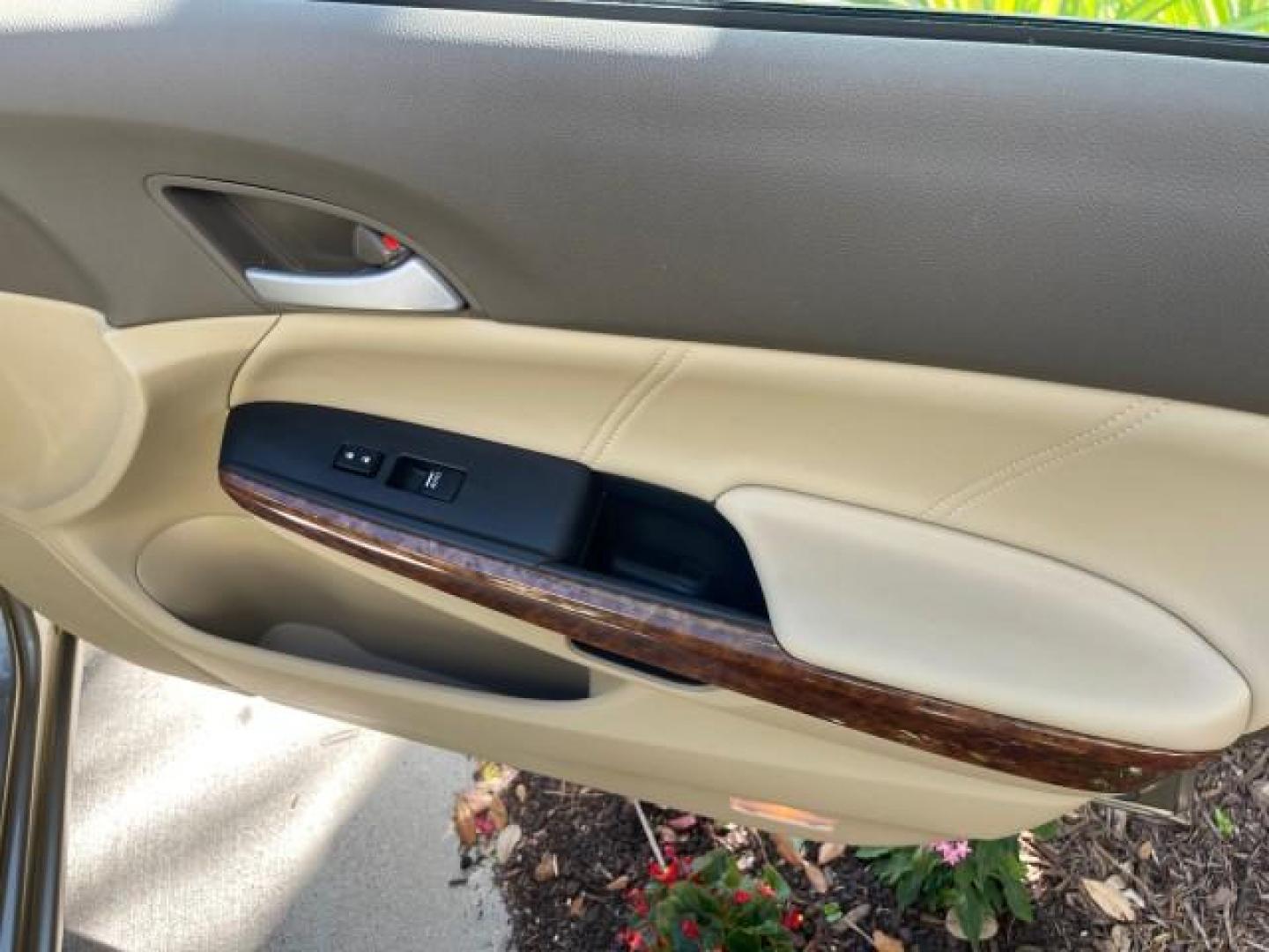 2009 Bold Beige Metallic /Ivory Honda Accord Sdn EX-L LOW MILES 31,501 (1HGCP26819A) with an 2.4L DOHC MPFI 16-Valve i-VTEC I4 Engine engine, Automatic transmission, located at 4701 North Dixie Hwy, Pompano Beach, FL, 33064, (954) 422-2889, 26.240938, -80.123474 - OUR WEBPAGE FLORIDACARS1.COM HAS OVER 100 PHOTOS AND FREE CARFAX LINK 2009 HONDA ACCORD EX-L VIN: 1HGCP26819A145607 1 H G C P 2 6 8 1 9 A 1 4 5 6 0 7 SEDAN 4 DR 2.4L I4 F DOHC 16V 31 MPG GASOLINE FRONT WHEEL DRIVE Top Features Alloy Wheels Satellite Radio Ready Front Seat Heaters Sunroof(s) Leather - Photo#94