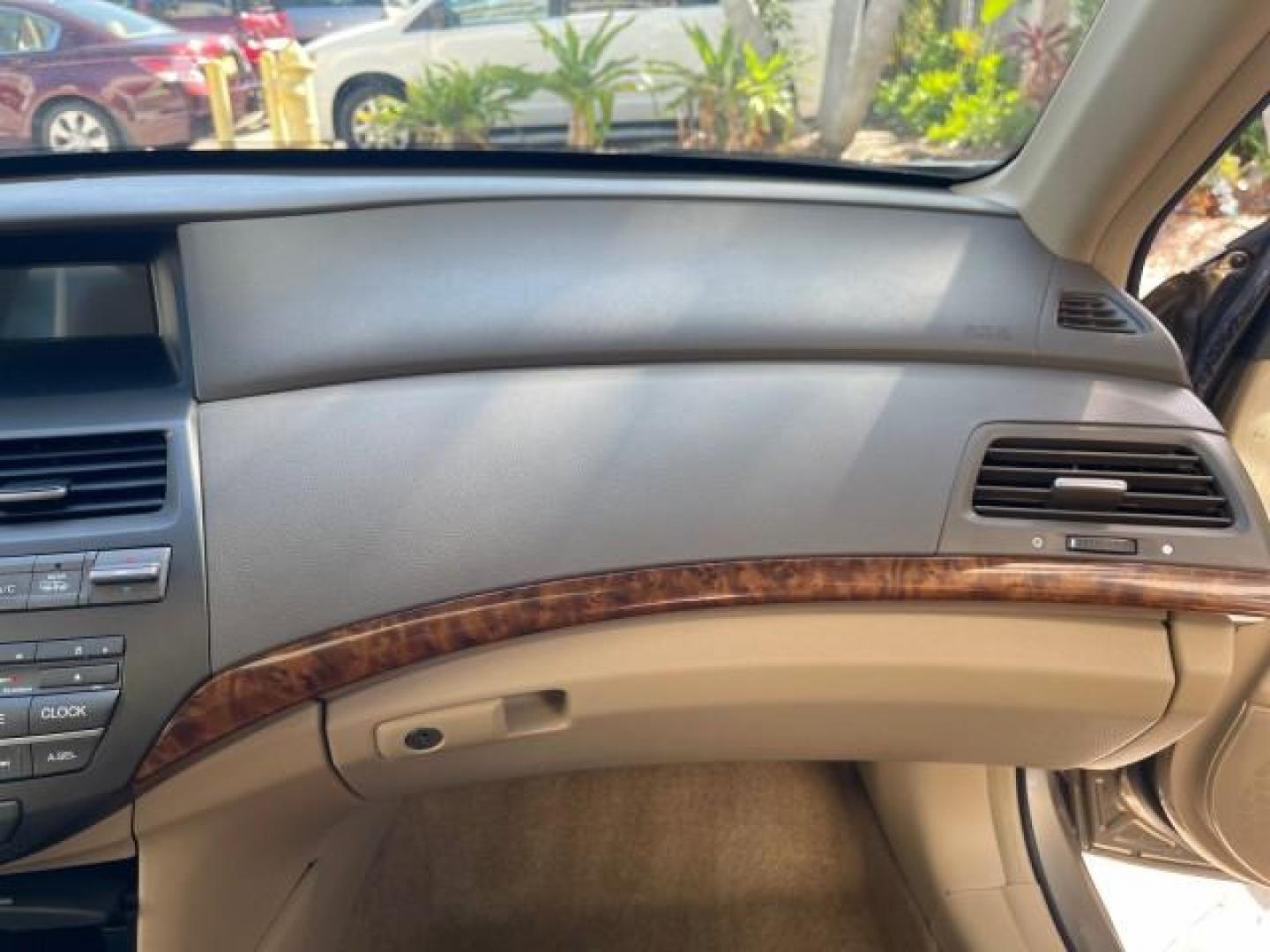 2009 Bold Beige Metallic /Ivory Honda Accord Sdn EX-L LOW MILES 31,501 (1HGCP26819A) with an 2.4L DOHC MPFI 16-Valve i-VTEC I4 Engine engine, Automatic transmission, located at 4701 North Dixie Hwy, Pompano Beach, FL, 33064, (954) 422-2889, 26.240938, -80.123474 - OUR WEBPAGE FLORIDACARS1.COM HAS OVER 100 PHOTOS AND FREE CARFAX LINK 2009 HONDA ACCORD EX-L VIN: 1HGCP26819A145607 1 H G C P 2 6 8 1 9 A 1 4 5 6 0 7 SEDAN 4 DR 2.4L I4 F DOHC 16V 31 MPG GASOLINE FRONT WHEEL DRIVE Top Features Alloy Wheels Satellite Radio Ready Front Seat Heaters Sunroof(s) Leather - Photo#95