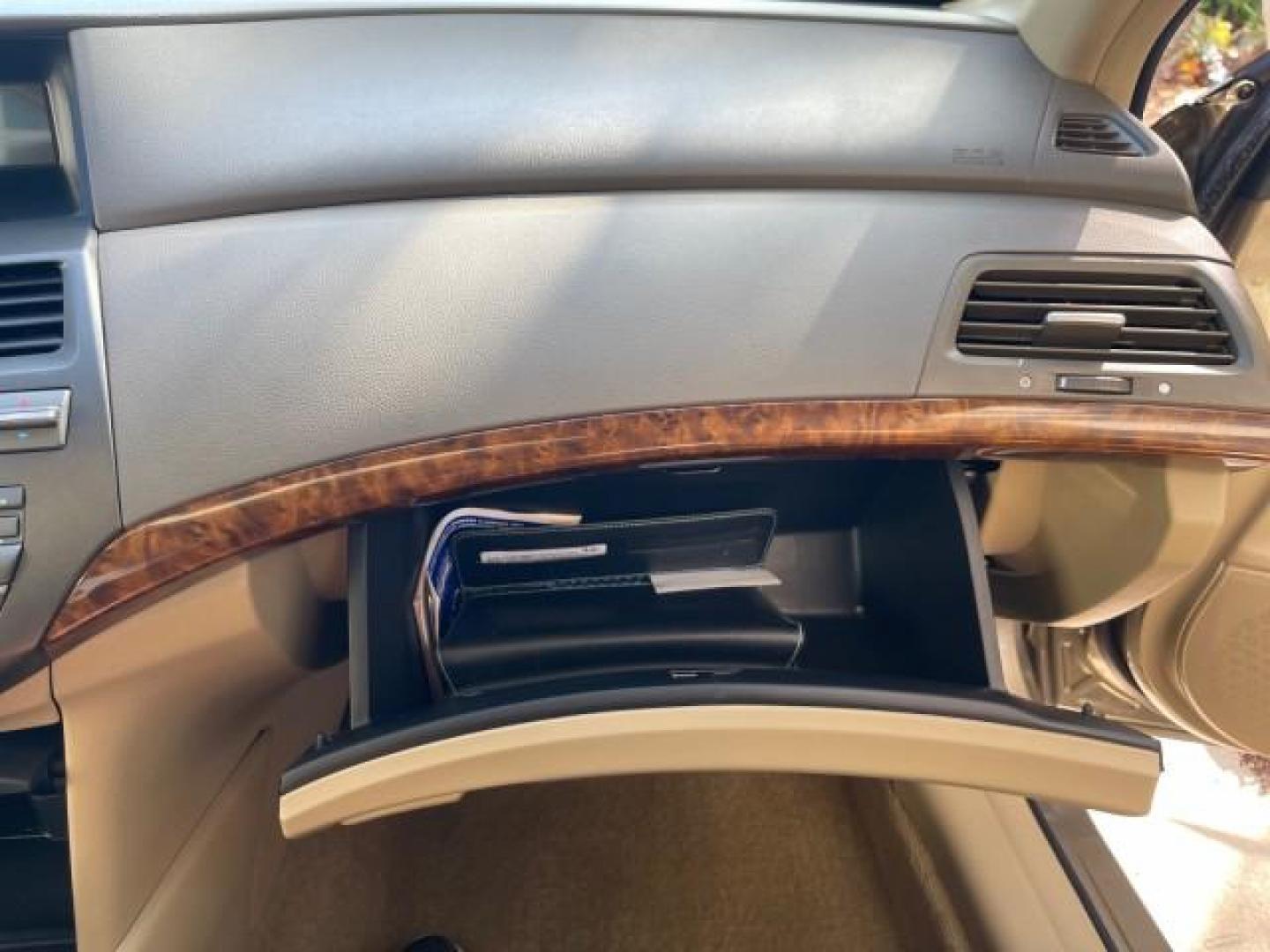 2009 Bold Beige Metallic /Ivory Honda Accord Sdn EX-L LOW MILES 31,501 (1HGCP26819A) with an 2.4L DOHC MPFI 16-Valve i-VTEC I4 Engine engine, Automatic transmission, located at 4701 North Dixie Hwy, Pompano Beach, FL, 33064, (954) 422-2889, 26.240938, -80.123474 - OUR WEBPAGE FLORIDACARS1.COM HAS OVER 100 PHOTOS AND FREE CARFAX LINK 2009 HONDA ACCORD EX-L VIN: 1HGCP26819A145607 1 H G C P 2 6 8 1 9 A 1 4 5 6 0 7 SEDAN 4 DR 2.4L I4 F DOHC 16V 31 MPG GASOLINE FRONT WHEEL DRIVE Top Features Alloy Wheels Satellite Radio Ready Front Seat Heaters Sunroof(s) Leather - Photo#96