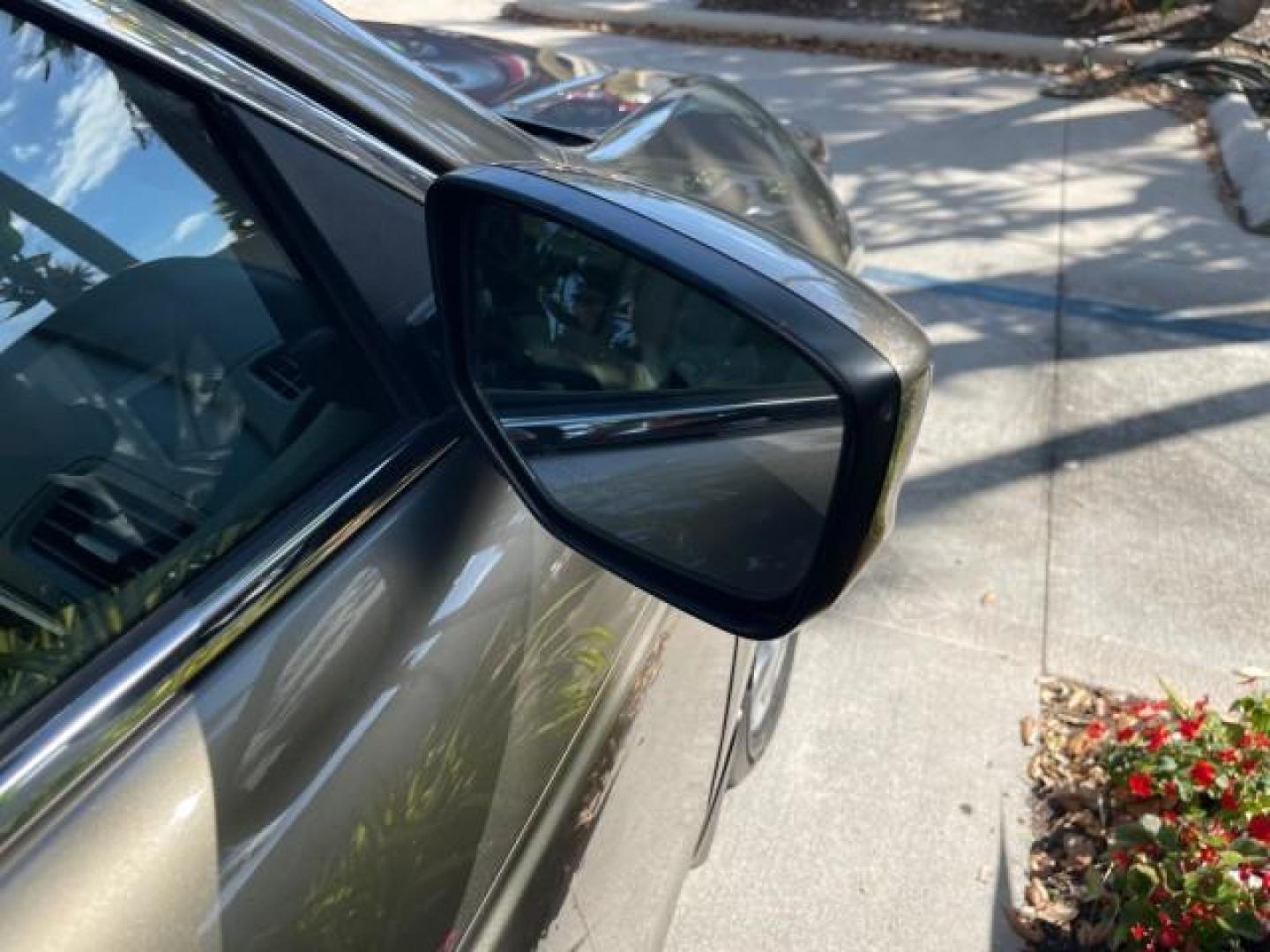 2009 Bold Beige Metallic /Ivory Honda Accord Sdn EX-L LOW MILES 31,501 (1HGCP26819A) with an 2.4L DOHC MPFI 16-Valve i-VTEC I4 Engine engine, Automatic transmission, located at 4701 North Dixie Hwy, Pompano Beach, FL, 33064, (954) 422-2889, 26.240938, -80.123474 - OUR WEBPAGE FLORIDACARS1.COM HAS OVER 100 PHOTOS AND FREE CARFAX LINK 2009 HONDA ACCORD EX-L VIN: 1HGCP26819A145607 1 H G C P 2 6 8 1 9 A 1 4 5 6 0 7 SEDAN 4 DR 2.4L I4 F DOHC 16V 31 MPG GASOLINE FRONT WHEEL DRIVE Top Features Alloy Wheels Satellite Radio Ready Front Seat Heaters Sunroof(s) Leather - Photo#97