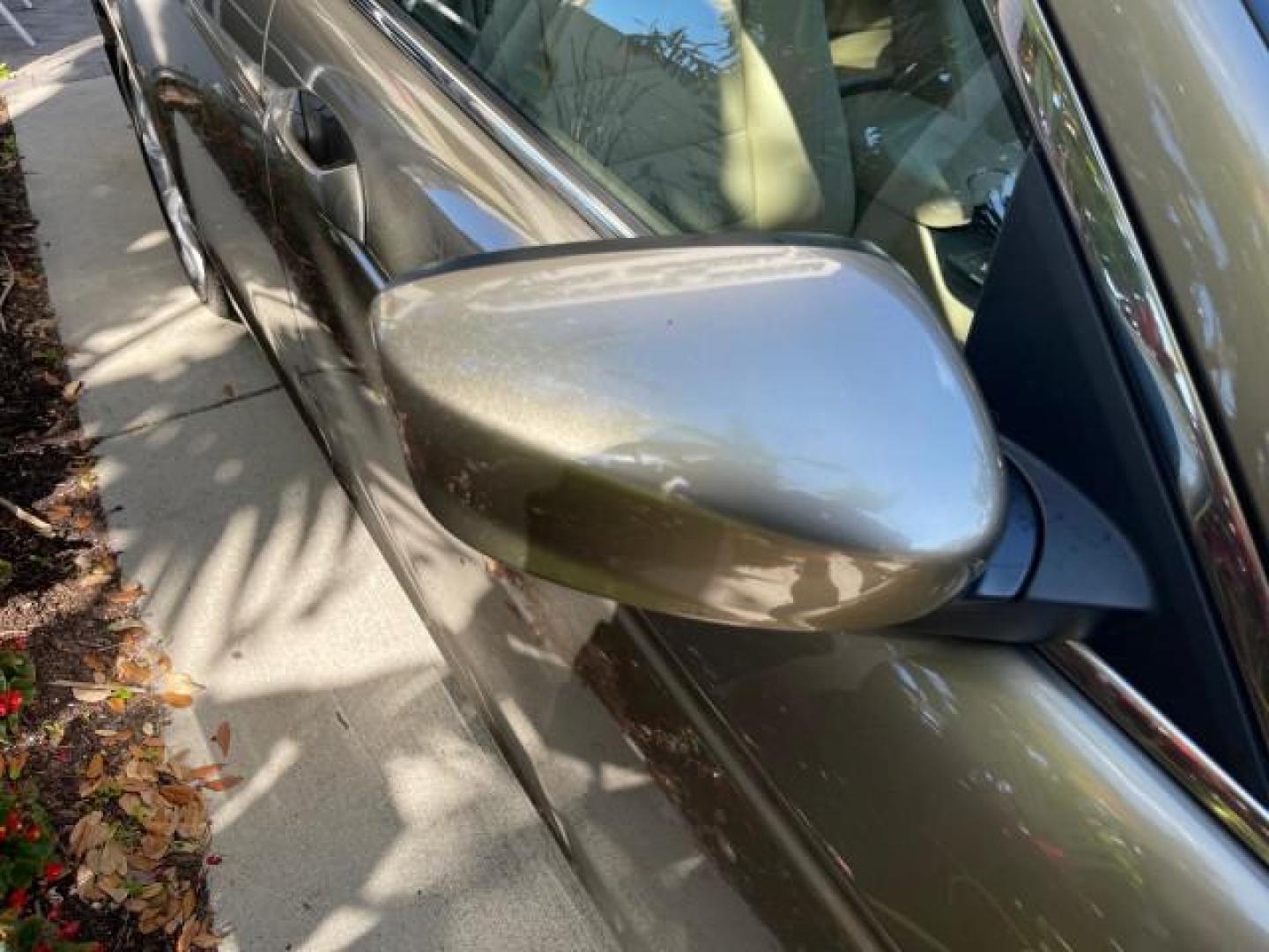 2009 Bold Beige Metallic /Ivory Honda Accord Sdn EX-L LOW MILES 31,501 (1HGCP26819A) with an 2.4L DOHC MPFI 16-Valve i-VTEC I4 Engine engine, Automatic transmission, located at 4701 North Dixie Hwy, Pompano Beach, FL, 33064, (954) 422-2889, 26.240938, -80.123474 - OUR WEBPAGE FLORIDACARS1.COM HAS OVER 100 PHOTOS AND FREE CARFAX LINK 2009 HONDA ACCORD EX-L VIN: 1HGCP26819A145607 1 H G C P 2 6 8 1 9 A 1 4 5 6 0 7 SEDAN 4 DR 2.4L I4 F DOHC 16V 31 MPG GASOLINE FRONT WHEEL DRIVE Top Features Alloy Wheels Satellite Radio Ready Front Seat Heaters Sunroof(s) Leather - Photo#98