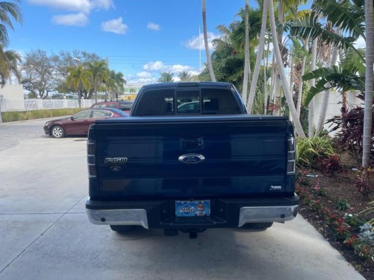 2010 Dark Blue Pearl Metallic /Tan Ford F-150 Lariat LOW MILES 60,628 NAV (1FTFW1CV4AF) with an 5.4L 3v EFI V8 FFV Engine engine, Automatic transmission, located at 4701 North Dixie Hwy, Pompano Beach, FL, 33064, (954) 422-2889, 26.240938, -80.123474 - OUR WEBPAGE FLORIDACARS1.COM HAS OVER 100 PHOTOS AND FREE CARFAX LINK 2010 FORD F-150 LARIAT $ 40,380 NEW VIN: 1FTFW1CV4AFD92632 1 F T F W 1 C V 4 A F D 9 2 6 3 2 CREW PICKUP 5.4L V8 F SOHC 24V FLEX FUEL REAR WHEEL DRIVE TOW PKG NO RECALLS Top Features Navigation System Bed Cover Parking Sensors Bed - Photo#11