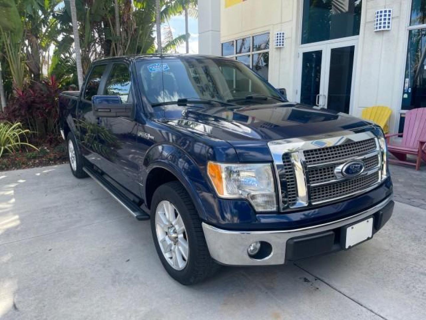 2010 Dark Blue Pearl Metallic /Tan Ford F-150 Lariat LOW MILES 60,628 NAV (1FTFW1CV4AF) with an 5.4L 3v EFI V8 FFV Engine engine, Automatic transmission, located at 4701 North Dixie Hwy, Pompano Beach, FL, 33064, (954) 422-2889, 26.240938, -80.123474 - OUR WEBPAGE FLORIDACARS1.COM HAS OVER 100 PHOTOS AND FREE CARFAX LINK 2010 FORD F-150 LARIAT $ 40,380 NEW VIN: 1FTFW1CV4AFD92632 1 F T F W 1 C V 4 A F D 9 2 6 3 2 CREW PICKUP 5.4L V8 F SOHC 24V FLEX FUEL REAR WHEEL DRIVE TOW PKG NO RECALLS Top Features Navigation System Bed Cover Parking Sensors Bed - Photo#1