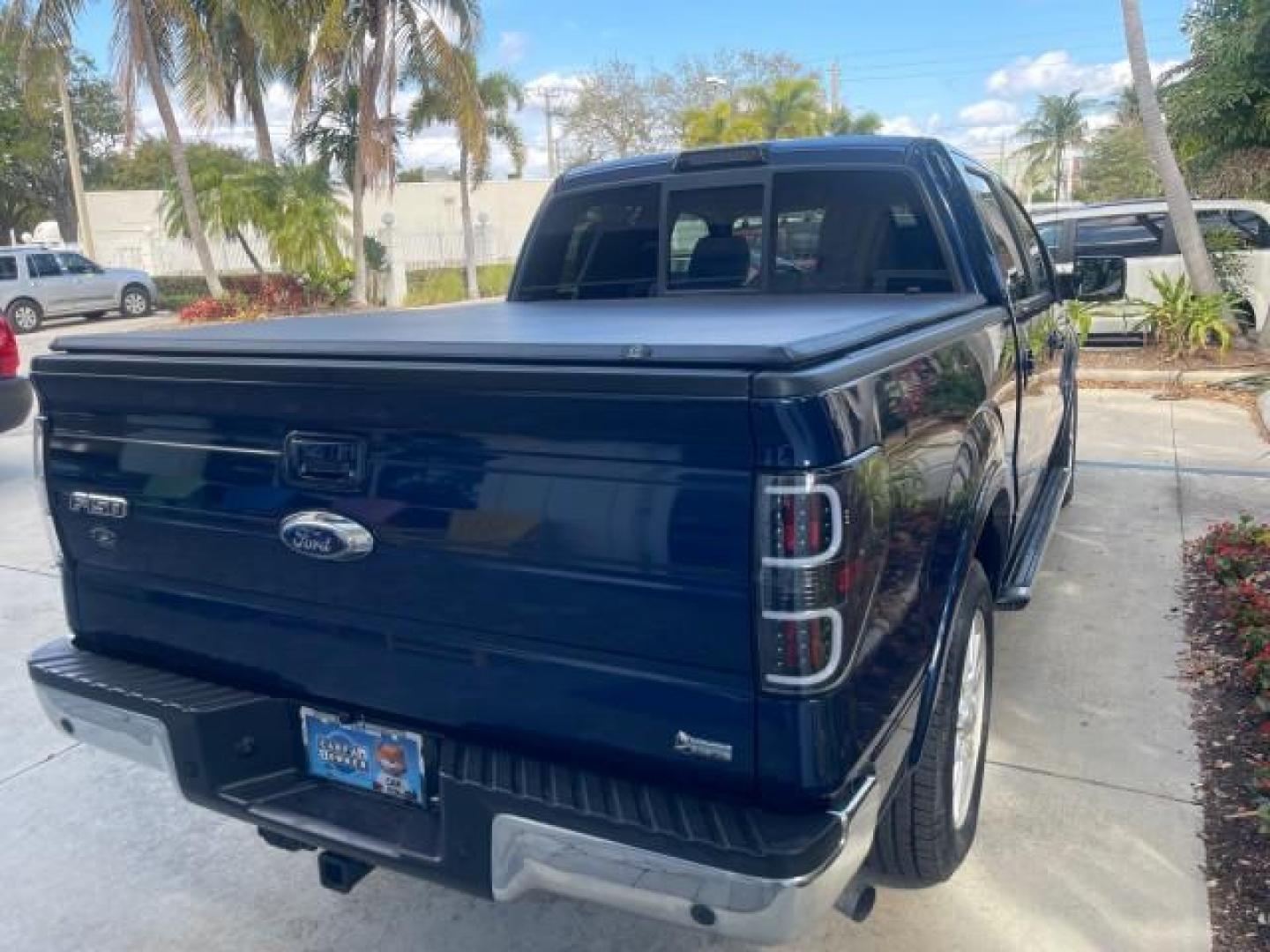 2010 Dark Blue Pearl Metallic /Tan Ford F-150 Lariat LOW MILES 60,628 NAV (1FTFW1CV4AF) with an 5.4L 3v EFI V8 FFV Engine engine, Automatic transmission, located at 4701 North Dixie Hwy, Pompano Beach, FL, 33064, (954) 422-2889, 26.240938, -80.123474 - OUR WEBPAGE FLORIDACARS1.COM HAS OVER 100 PHOTOS AND FREE CARFAX LINK 2010 FORD F-150 LARIAT $ 40,380 NEW VIN: 1FTFW1CV4AFD92632 1 F T F W 1 C V 4 A F D 9 2 6 3 2 CREW PICKUP 5.4L V8 F SOHC 24V FLEX FUEL REAR WHEEL DRIVE TOW PKG NO RECALLS Top Features Navigation System Bed Cover Parking Sensors Bed - Photo#24