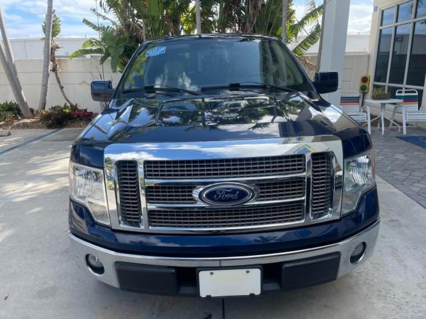 2010 Dark Blue Pearl Metallic /Tan Ford F-150 Lariat LOW MILES 60,628 NAV (1FTFW1CV4AF) with an 5.4L 3v EFI V8 FFV Engine engine, Automatic transmission, located at 4701 North Dixie Hwy, Pompano Beach, FL, 33064, (954) 422-2889, 26.240938, -80.123474 - OUR WEBPAGE FLORIDACARS1.COM HAS OVER 100 PHOTOS AND FREE CARFAX LINK 2010 FORD F-150 LARIAT $ 40,380 NEW VIN: 1FTFW1CV4AFD92632 1 F T F W 1 C V 4 A F D 9 2 6 3 2 CREW PICKUP 5.4L V8 F SOHC 24V FLEX FUEL REAR WHEEL DRIVE TOW PKG NO RECALLS Top Features Navigation System Bed Cover Parking Sensors Bed - Photo#2