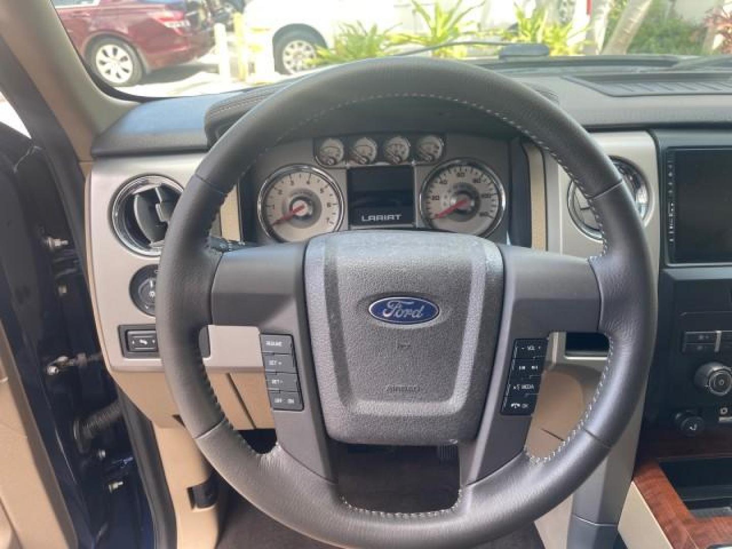 2010 Dark Blue Pearl Metallic /Tan Ford F-150 Lariat LOW MILES 60,628 NAV (1FTFW1CV4AF) with an 5.4L 3v EFI V8 FFV Engine engine, Automatic transmission, located at 4701 North Dixie Hwy, Pompano Beach, FL, 33064, (954) 422-2889, 26.240938, -80.123474 - OUR WEBPAGE FLORIDACARS1.COM HAS OVER 100 PHOTOS AND FREE CARFAX LINK 2010 FORD F-150 LARIAT $ 40,380 NEW VIN: 1FTFW1CV4AFD92632 1 F T F W 1 C V 4 A F D 9 2 6 3 2 CREW PICKUP 5.4L V8 F SOHC 24V FLEX FUEL REAR WHEEL DRIVE TOW PKG NO RECALLS Top Features Navigation System Bed Cover Parking Sensors Bed - Photo#33