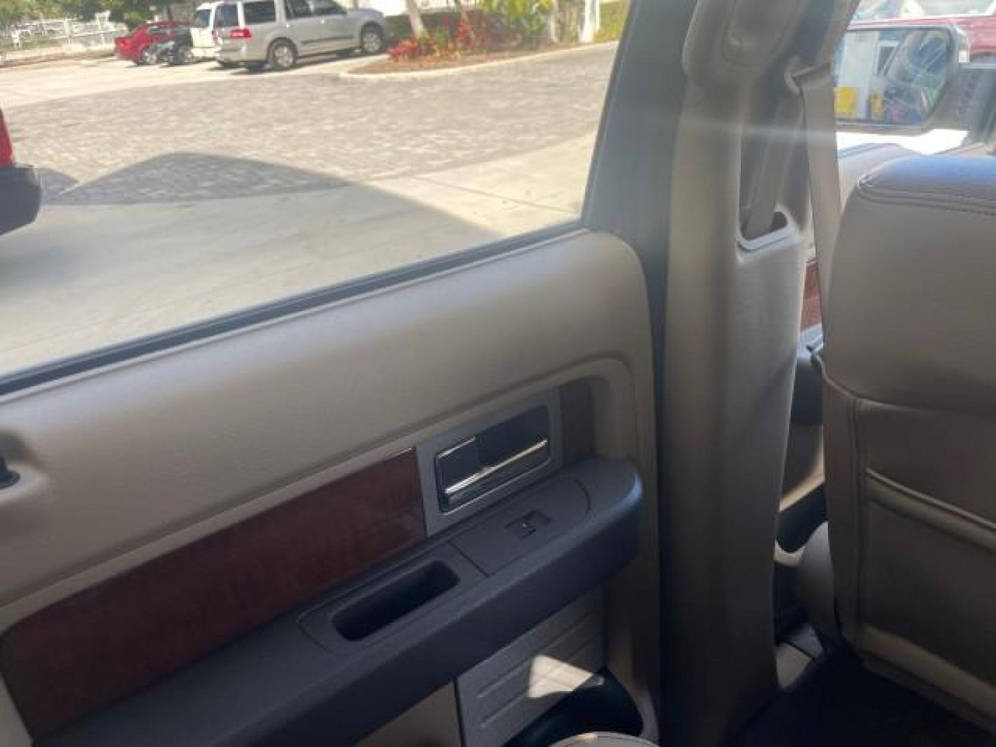 2010 Dark Blue Pearl Metallic /Tan Ford F-150 Lariat LOW MILES 60,628 NAV (1FTFW1CV4AF) with an 5.4L 3v EFI V8 FFV Engine engine, Automatic transmission, located at 4701 North Dixie Hwy, Pompano Beach, FL, 33064, (954) 422-2889, 26.240938, -80.123474 - OUR WEBPAGE FLORIDACARS1.COM HAS OVER 100 PHOTOS AND FREE CARFAX LINK 2010 FORD F-150 LARIAT $ 40,380 NEW VIN: 1FTFW1CV4AFD92632 1 F T F W 1 C V 4 A F D 9 2 6 3 2 CREW PICKUP 5.4L V8 F SOHC 24V FLEX FUEL REAR WHEEL DRIVE TOW PKG NO RECALLS Top Features Navigation System Bed Cover Parking Sensors Bed - Photo#53
