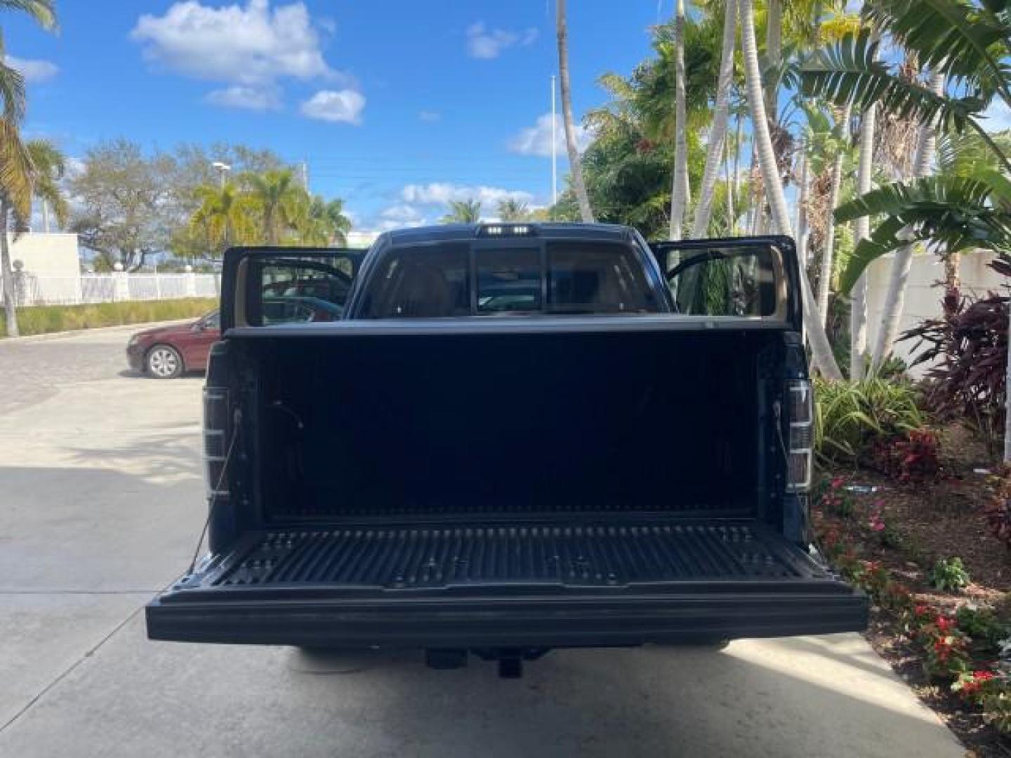 2010 Dark Blue Pearl Metallic /Tan Ford F-150 Lariat LOW MILES 60,628 NAV (1FTFW1CV4AF) with an 5.4L 3v EFI V8 FFV Engine engine, Automatic transmission, located at 4701 North Dixie Hwy, Pompano Beach, FL, 33064, (954) 422-2889, 26.240938, -80.123474 - OUR WEBPAGE FLORIDACARS1.COM HAS OVER 100 PHOTOS AND FREE CARFAX LINK 2010 FORD F-150 LARIAT $ 40,380 NEW VIN: 1FTFW1CV4AFD92632 1 F T F W 1 C V 4 A F D 9 2 6 3 2 CREW PICKUP 5.4L V8 F SOHC 24V FLEX FUEL REAR WHEEL DRIVE TOW PKG NO RECALLS Top Features Navigation System Bed Cover Parking Sensors Bed - Photo#5