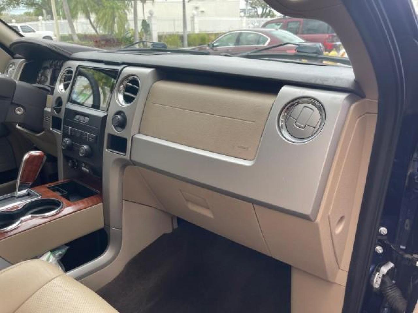 2010 Dark Blue Pearl Metallic /Tan Ford F-150 Lariat LOW MILES 60,628 NAV (1FTFW1CV4AF) with an 5.4L 3v EFI V8 FFV Engine engine, Automatic transmission, located at 4701 North Dixie Hwy, Pompano Beach, FL, 33064, (954) 422-2889, 26.240938, -80.123474 - OUR WEBPAGE FLORIDACARS1.COM HAS OVER 100 PHOTOS AND FREE CARFAX LINK 2010 FORD F-150 LARIAT $ 40,380 NEW VIN: 1FTFW1CV4AFD92632 1 F T F W 1 C V 4 A F D 9 2 6 3 2 CREW PICKUP 5.4L V8 F SOHC 24V FLEX FUEL REAR WHEEL DRIVE TOW PKG NO RECALLS Top Features Navigation System Bed Cover Parking Sensors Bed - Photo#77