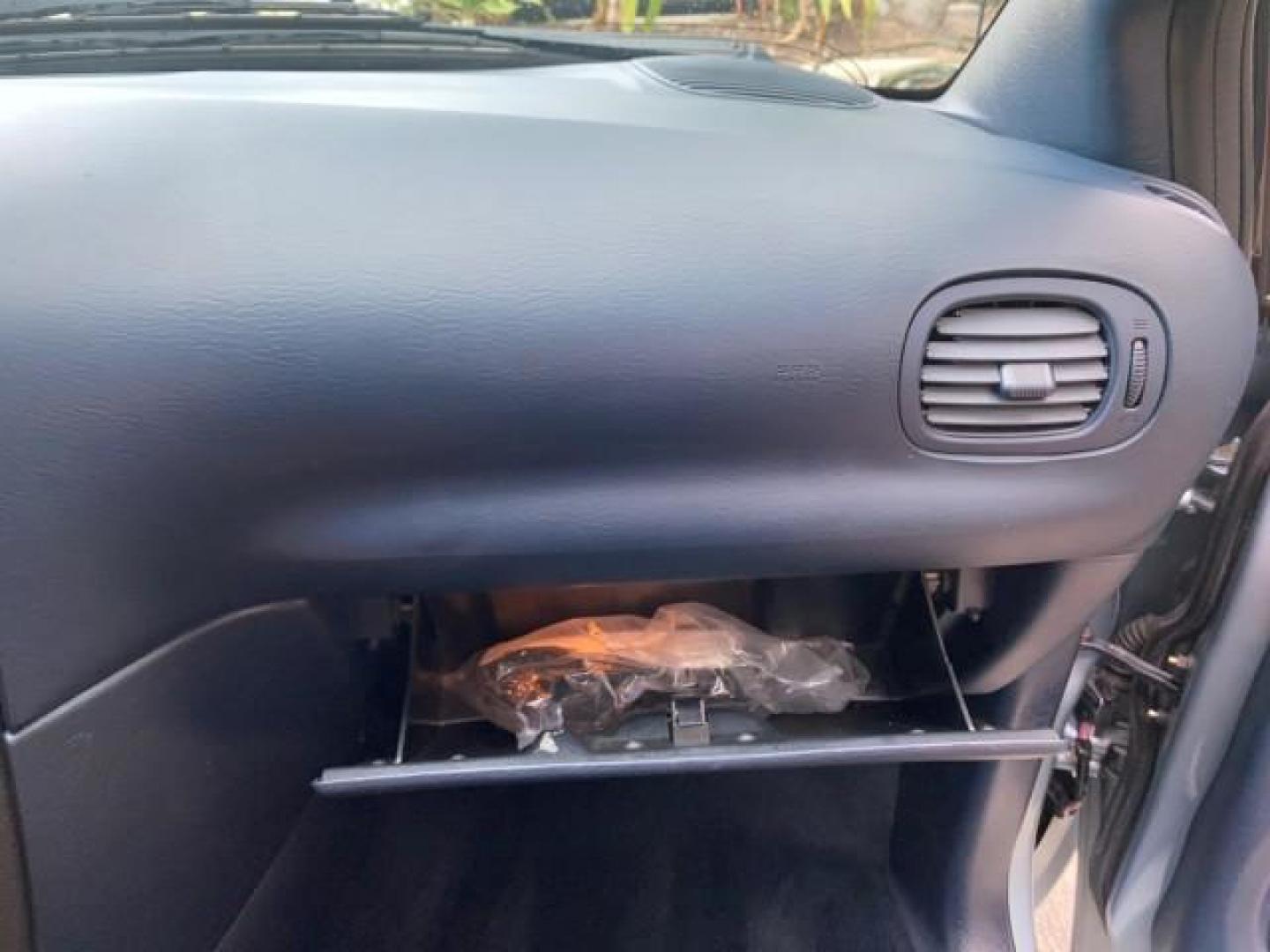 2002 Steel Blue Pearl /Navy Blue Dodge Caravan Sport 1 OWNER LOW MILES 71,753 (2B4GP44342R) with an 3.3L SMPI Flex-Fuel V6 Engine engine, Automatic transmission, located at 4701 North Dixie Hwy, Pompano Beach, FL, 33064, (954) 422-2889, 26.240938, -80.123474 - OUR WEBPAGE FLORIDACARS1.COM HAS OVER 100 PHOTOS AND FREE CARFAX LINK 2002 DODGE GRAND CARAVAN SPORT VIN: 2B4GP44342R746558 2 B 4 G P 4 4 3 4 2 R 7 4 6 5 5 8 VAN 3.3L V6 F SOHC 12V GASOLINE FRONT WHEEL DRIVE Top Features Cloth Seats Third Row Seat Tow Hitch Basic Features ABS Brakes CD Audio Full Ro - Photo#83