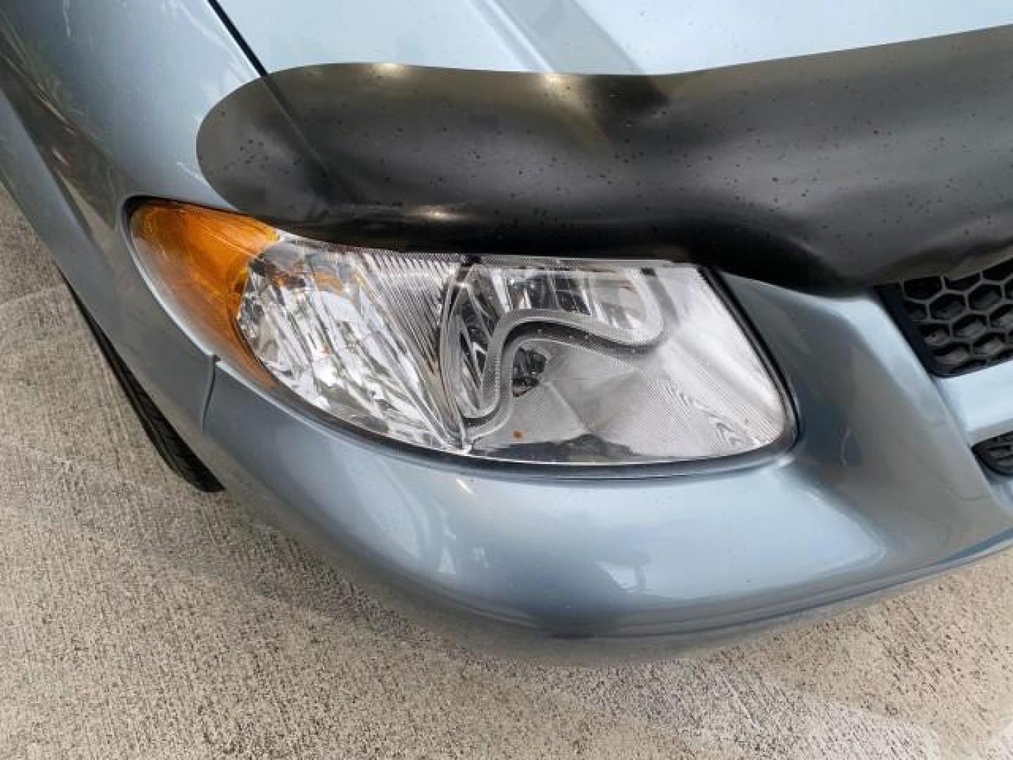 2002 Steel Blue Pearl /Navy Blue Dodge Caravan Sport 1 OWNER LOW MILES 71,753 (2B4GP44342R) with an 3.3L SMPI Flex-Fuel V6 Engine engine, Automatic transmission, located at 4701 North Dixie Hwy, Pompano Beach, FL, 33064, (954) 422-2889, 26.240938, -80.123474 - OUR WEBPAGE FLORIDACARS1.COM HAS OVER 100 PHOTOS AND FREE CARFAX LINK 2002 DODGE GRAND CARAVAN SPORT VIN: 2B4GP44342R746558 2 B 4 G P 4 4 3 4 2 R 7 4 6 5 5 8 VAN 3.3L V6 F SOHC 12V GASOLINE FRONT WHEEL DRIVE Top Features Cloth Seats Third Row Seat Tow Hitch Basic Features ABS Brakes CD Audio Full Ro - Photo#90