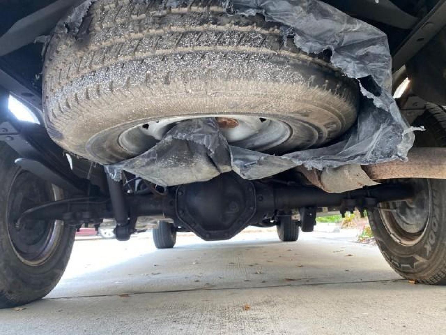 1999 Bright White /Mist Gray Dodge Ram 1500 LOW MILES 82,105 AC NICE (1B7HC16Z1XS) with an 5.9L SMPI V8 Magnum Engine engine, Automatic transmission, located at 4701 North Dixie Hwy, Pompano Beach, FL, 33064, (954) 422-2889, 26.240938, -80.123474 - OUR WEBPAGE FLORIDACARS1.COM HAS OVER 100 PHOTOS AND FREE CARFAX LINK 1999 DODGE RAM 1500 LARAMIE SLT NO RECALLS VIN: 1B7HC16Z1XS115419 1 B 7 H C 1 6 Z 1 X S 1 1 5 4 1 9 PICKUP 8 FT LONG BED 5.9L V8 F OHV 16V GASOLINE REAR WHEEL DRIVE TOW PKG Top Features Bed Liner Cloth Seats Running Boards Basic F - Photo#22