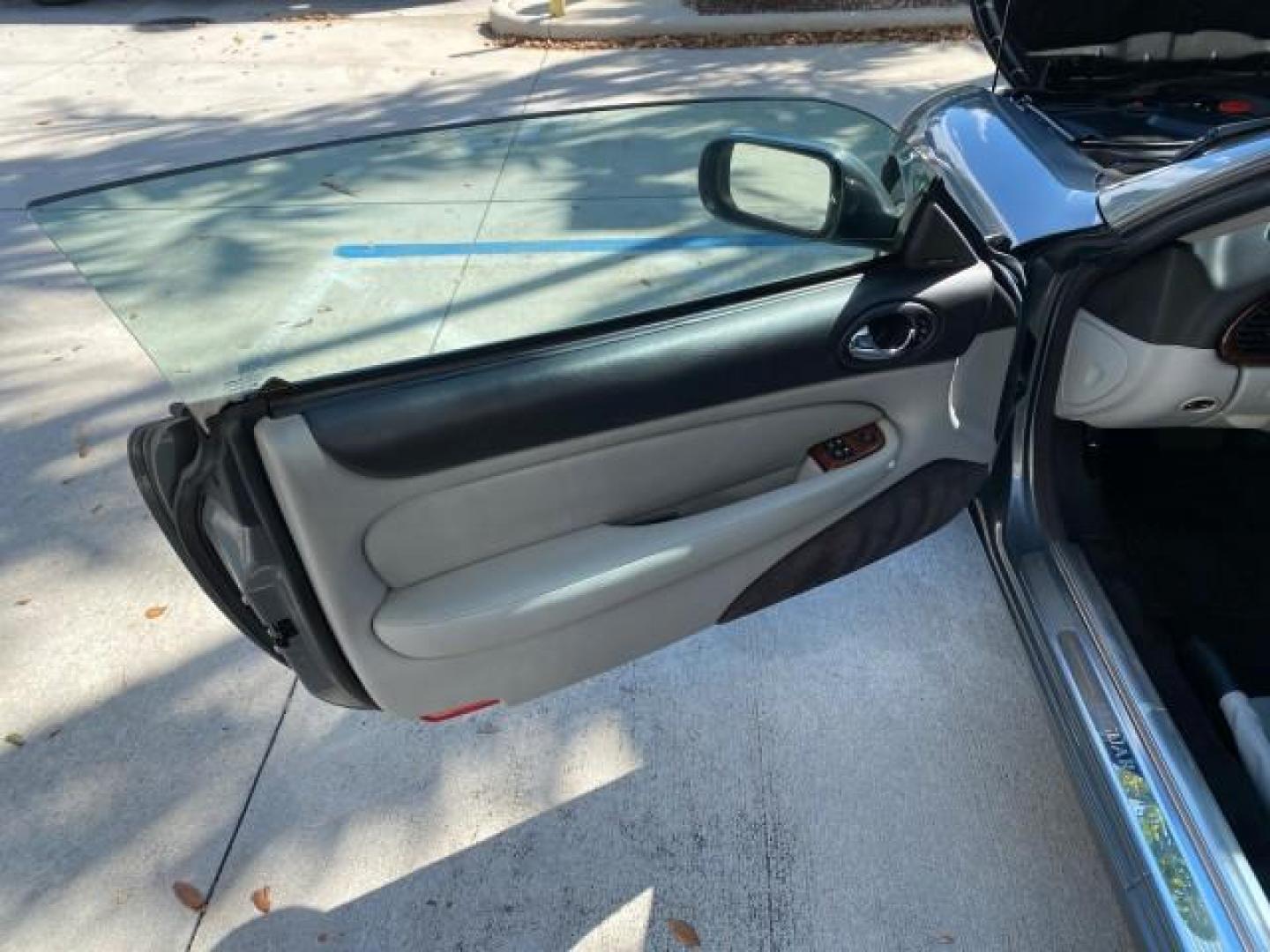 2003 Quartz /Dove Jaguar XK8 1 OWNER LOW MILES 37,004 (SAJDA42C132) with an 4.2L DOHC EFI 32-Valve Aluminum Alloy V8 Engine engine, Automatic transmission, located at 4701 North Dixie Hwy, Pompano Beach, FL, 33064, (954) 422-2889, 26.240938, -80.123474 - OUR WEBPAGE FLORIDACARS1.COM HAS OVER 100 PHOTOS AND FREE CARFAX LINK 2003 JAGUAR XK-SERIES XK8 $ 79,405 NEW ! VIN: SAJDA42C132A31624 S A J D A 4 2 C 1 3 2 A 3 1 6 2 4 CONVERTIBLE BOOT INCLUDED 4.2L V8 F DOHC GASOLINE REAR WHEEL DRIVE Top Features Alloy Wheels Leather Seats Alpine Sound System Navig - Photo#9