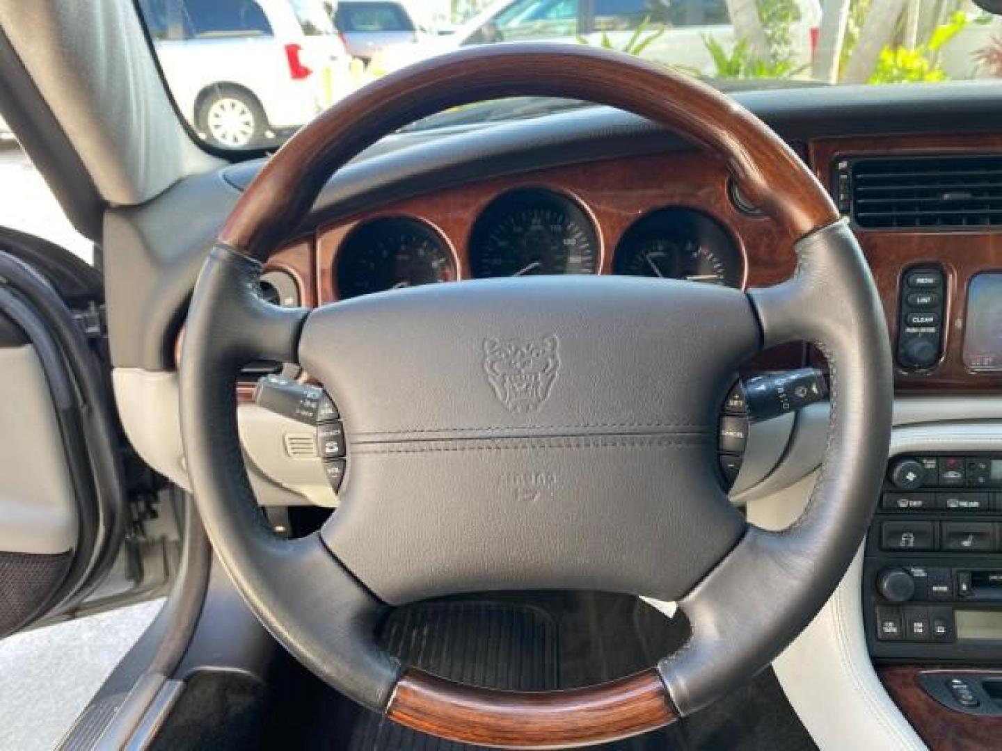 2003 Quartz /Dove Jaguar XK8 1 OWNER LOW MILES 37,004 (SAJDA42C132) with an 4.2L DOHC EFI 32-Valve Aluminum Alloy V8 Engine engine, Automatic transmission, located at 4701 North Dixie Hwy, Pompano Beach, FL, 33064, (954) 422-2889, 26.240938, -80.123474 - OUR WEBPAGE FLORIDACARS1.COM HAS OVER 100 PHOTOS AND FREE CARFAX LINK 2003 JAGUAR XK-SERIES XK8 $ 79,405 NEW ! VIN: SAJDA42C132A31624 S A J D A 4 2 C 1 3 2 A 3 1 6 2 4 CONVERTIBLE BOOT INCLUDED 4.2L V8 F DOHC GASOLINE REAR WHEEL DRIVE Top Features Alloy Wheels Leather Seats Alpine Sound System Navig - Photo#17
