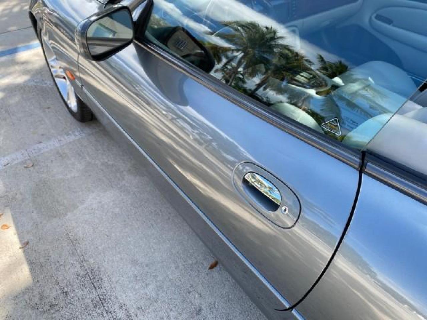 2003 Quartz /Dove Jaguar XK8 1 OWNER LOW MILES 37,004 (SAJDA42C132) with an 4.2L DOHC EFI 32-Valve Aluminum Alloy V8 Engine engine, Automatic transmission, located at 4701 North Dixie Hwy, Pompano Beach, FL, 33064, (954) 422-2889, 26.240938, -80.123474 - OUR WEBPAGE FLORIDACARS1.COM HAS OVER 100 PHOTOS AND FREE CARFAX LINK 2003 JAGUAR XK-SERIES XK8 $ 79,405 NEW ! VIN: SAJDA42C132A31624 S A J D A 4 2 C 1 3 2 A 3 1 6 2 4 CONVERTIBLE BOOT INCLUDED 4.2L V8 F DOHC GASOLINE REAR WHEEL DRIVE Top Features Alloy Wheels Leather Seats Alpine Sound System Navig - Photo#32
