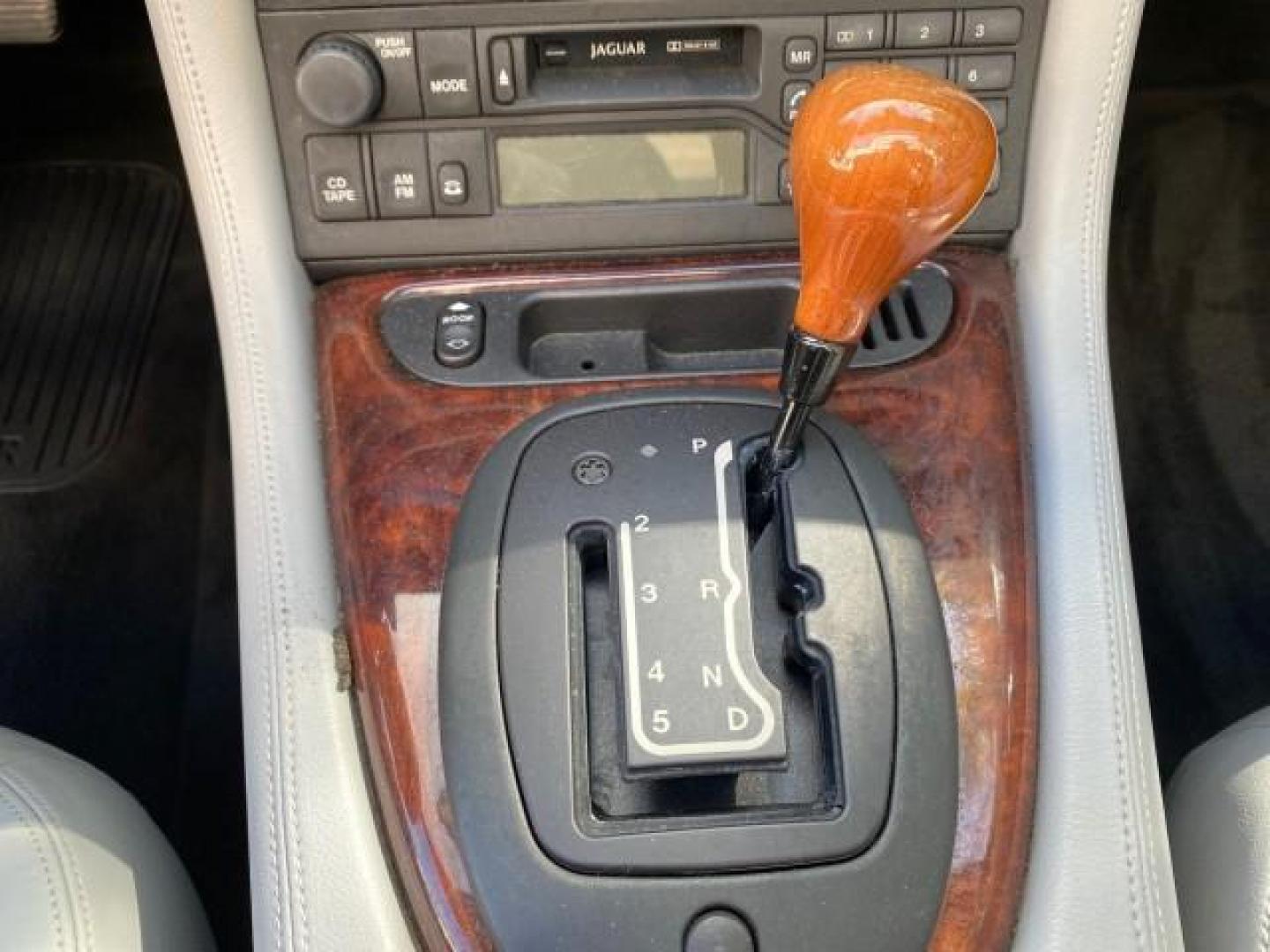2003 Quartz /Dove Jaguar XK8 1 OWNER LOW MILES 37,004 (SAJDA42C132) with an 4.2L DOHC EFI 32-Valve Aluminum Alloy V8 Engine engine, Automatic transmission, located at 4701 North Dixie Hwy, Pompano Beach, FL, 33064, (954) 422-2889, 26.240938, -80.123474 - OUR WEBPAGE FLORIDACARS1.COM HAS OVER 100 PHOTOS AND FREE CARFAX LINK 2003 JAGUAR XK-SERIES XK8 $ 79,405 NEW ! VIN: SAJDA42C132A31624 S A J D A 4 2 C 1 3 2 A 3 1 6 2 4 CONVERTIBLE BOOT INCLUDED 4.2L V8 F DOHC GASOLINE REAR WHEEL DRIVE Top Features Alloy Wheels Leather Seats Alpine Sound System Navig - Photo#48