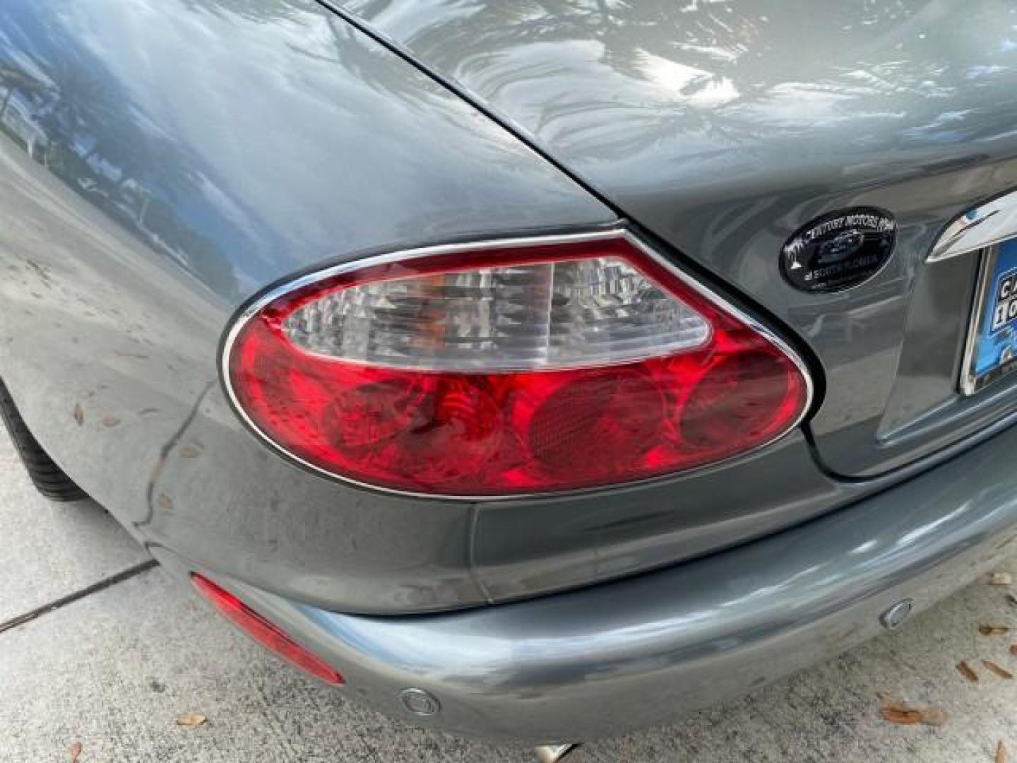 2003 Quartz /Dove Jaguar XK8 1 OWNER LOW MILES 37,004 (SAJDA42C132) with an 4.2L DOHC EFI 32-Valve Aluminum Alloy V8 Engine engine, Automatic transmission, located at 4701 North Dixie Hwy, Pompano Beach, FL, 33064, (954) 422-2889, 26.240938, -80.123474 - OUR WEBPAGE FLORIDACARS1.COM HAS OVER 100 PHOTOS AND FREE CARFAX LINK 2003 JAGUAR XK-SERIES XK8 $ 79,405 NEW ! VIN: SAJDA42C132A31624 S A J D A 4 2 C 1 3 2 A 3 1 6 2 4 CONVERTIBLE BOOT INCLUDED 4.2L V8 F DOHC GASOLINE REAR WHEEL DRIVE Top Features Alloy Wheels Leather Seats Alpine Sound System Navig - Photo#70