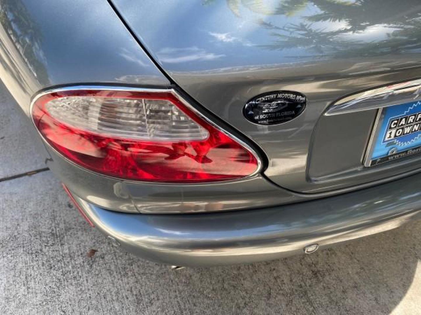 2003 Quartz /Dove Jaguar XK8 1 OWNER LOW MILES 37,004 (SAJDA42C132) with an 4.2L DOHC EFI 32-Valve Aluminum Alloy V8 Engine engine, Automatic transmission, located at 4701 North Dixie Hwy, Pompano Beach, FL, 33064, (954) 422-2889, 26.240938, -80.123474 - OUR WEBPAGE FLORIDACARS1.COM HAS OVER 100 PHOTOS AND FREE CARFAX LINK 2003 JAGUAR XK-SERIES XK8 $ 79,405 NEW ! VIN: SAJDA42C132A31624 S A J D A 4 2 C 1 3 2 A 3 1 6 2 4 CONVERTIBLE BOOT INCLUDED 4.2L V8 F DOHC GASOLINE REAR WHEEL DRIVE Top Features Alloy Wheels Leather Seats Alpine Sound System Navig - Photo#71