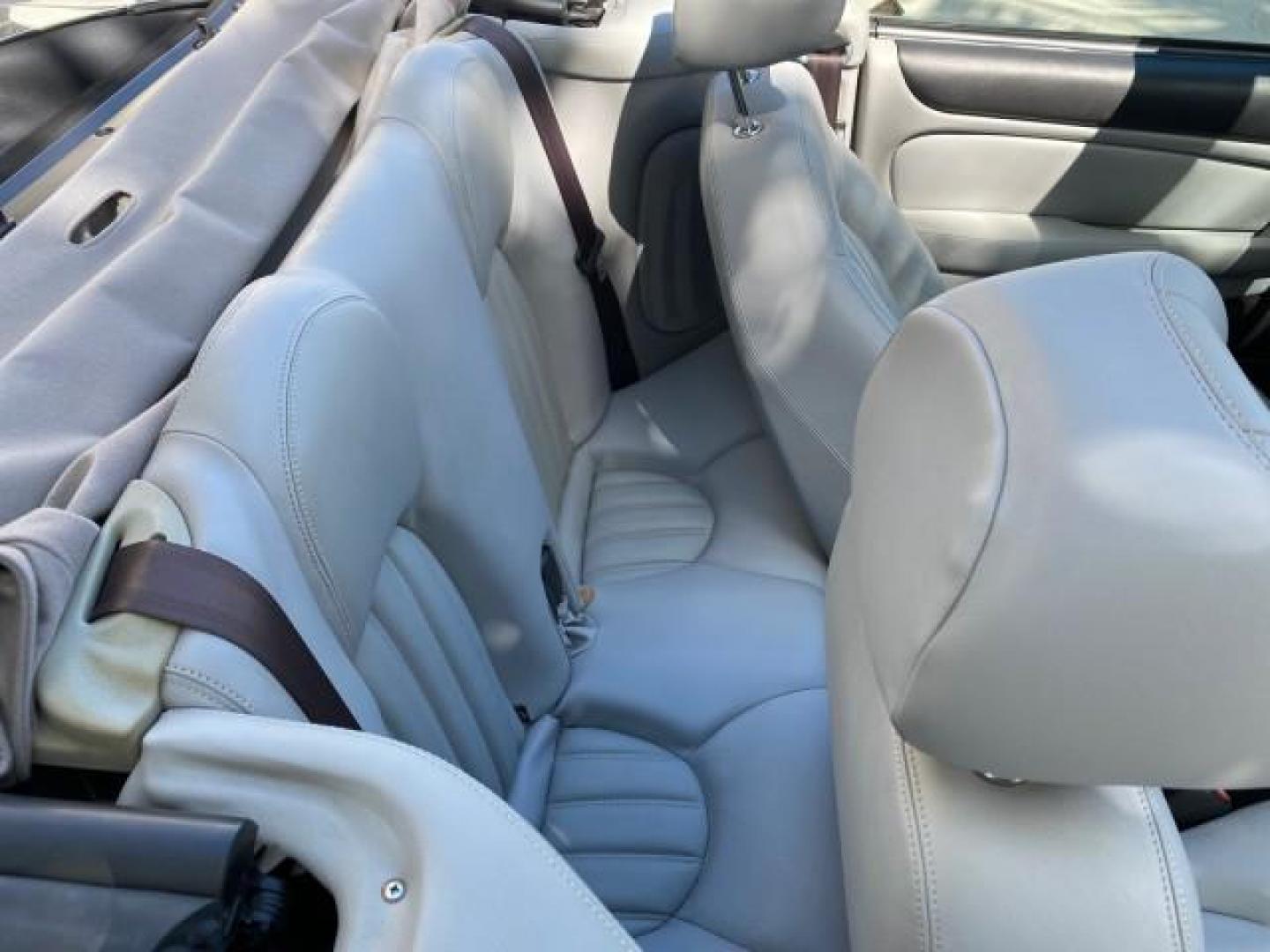 2003 Quartz /Dove Jaguar XK8 1 OWNER LOW MILES 37,004 (SAJDA42C132) with an 4.2L DOHC EFI 32-Valve Aluminum Alloy V8 Engine engine, Automatic transmission, located at 4701 North Dixie Hwy, Pompano Beach, FL, 33064, (954) 422-2889, 26.240938, -80.123474 - OUR WEBPAGE FLORIDACARS1.COM HAS OVER 100 PHOTOS AND FREE CARFAX LINK 2003 JAGUAR XK-SERIES XK8 $ 79,405 NEW ! VIN: SAJDA42C132A31624 S A J D A 4 2 C 1 3 2 A 3 1 6 2 4 CONVERTIBLE BOOT INCLUDED 4.2L V8 F DOHC GASOLINE REAR WHEEL DRIVE Top Features Alloy Wheels Leather Seats Alpine Sound System Navig - Photo#86