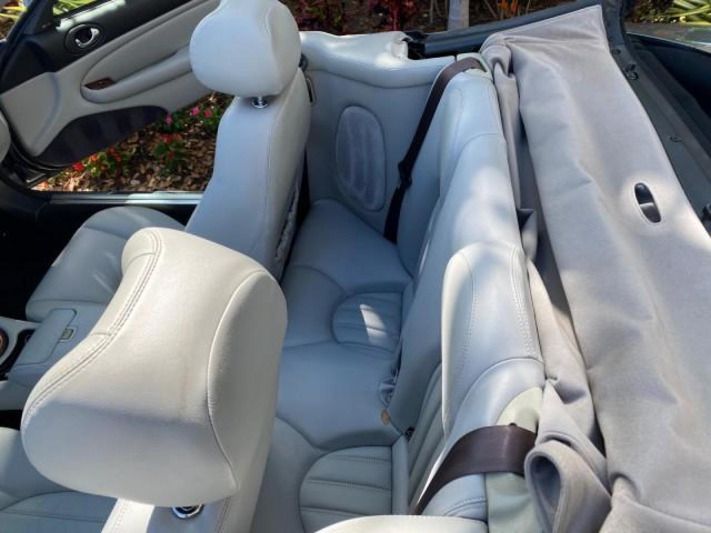 2003 Quartz /Dove Jaguar XK8 1 OWNER LOW MILES 37,004 (SAJDA42C132) with an 4.2L DOHC EFI 32-Valve Aluminum Alloy V8 Engine engine, Automatic transmission, located at 4701 North Dixie Hwy, Pompano Beach, FL, 33064, (954) 422-2889, 26.240938, -80.123474 - OUR WEBPAGE FLORIDACARS1.COM HAS OVER 100 PHOTOS AND FREE CARFAX LINK 2003 JAGUAR XK-SERIES XK8 $ 79,405 NEW ! VIN: SAJDA42C132A31624 S A J D A 4 2 C 1 3 2 A 3 1 6 2 4 CONVERTIBLE BOOT INCLUDED 4.2L V8 F DOHC GASOLINE REAR WHEEL DRIVE Top Features Alloy Wheels Leather Seats Alpine Sound System Navig - Photo#87