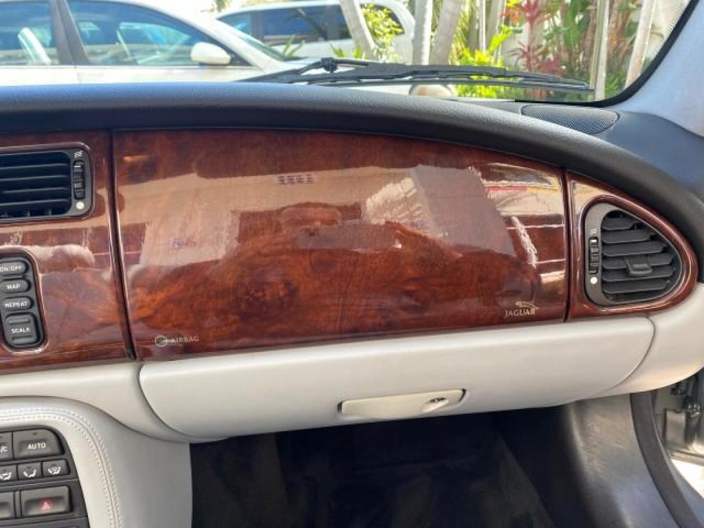 2003 Quartz /Dove Jaguar XK8 1 OWNER LOW MILES 37,004 (SAJDA42C132) with an 4.2L DOHC EFI 32-Valve Aluminum Alloy V8 Engine engine, Automatic transmission, located at 4701 North Dixie Hwy, Pompano Beach, FL, 33064, (954) 422-2889, 26.240938, -80.123474 - OUR WEBPAGE FLORIDACARS1.COM HAS OVER 100 PHOTOS AND FREE CARFAX LINK 2003 JAGUAR XK-SERIES XK8 $ 79,405 NEW ! VIN: SAJDA42C132A31624 S A J D A 4 2 C 1 3 2 A 3 1 6 2 4 CONVERTIBLE BOOT INCLUDED 4.2L V8 F DOHC GASOLINE REAR WHEEL DRIVE Top Features Alloy Wheels Leather Seats Alpine Sound System Navig - Photo#90