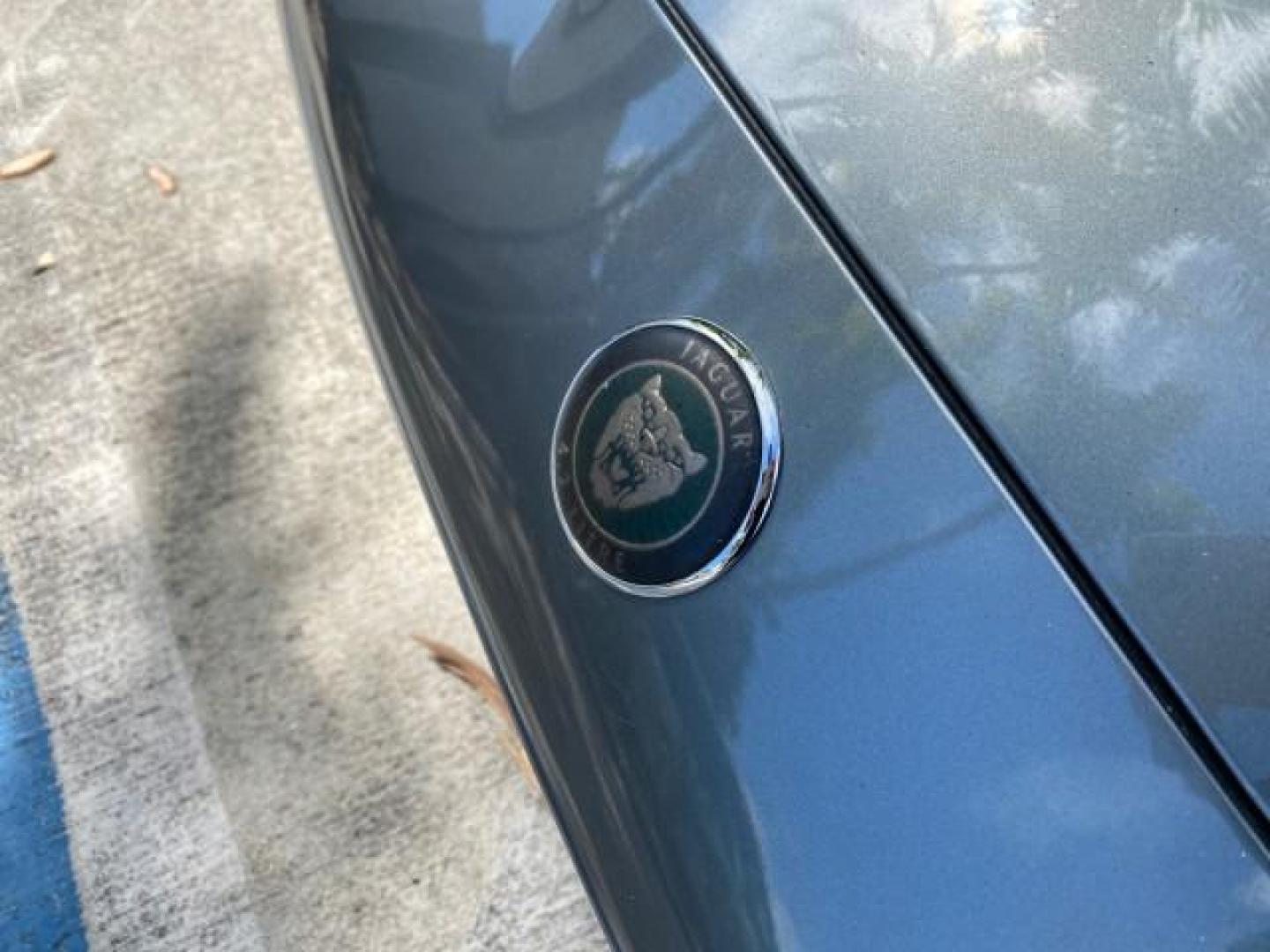 2003 Quartz /Dove Jaguar XK8 1 OWNER LOW MILES 37,004 (SAJDA42C132) with an 4.2L DOHC EFI 32-Valve Aluminum Alloy V8 Engine engine, Automatic transmission, located at 4701 North Dixie Hwy, Pompano Beach, FL, 33064, (954) 422-2889, 26.240938, -80.123474 - OUR WEBPAGE FLORIDACARS1.COM HAS OVER 100 PHOTOS AND FREE CARFAX LINK 2003 JAGUAR XK-SERIES XK8 $ 79,405 NEW ! VIN: SAJDA42C132A31624 S A J D A 4 2 C 1 3 2 A 3 1 6 2 4 CONVERTIBLE BOOT INCLUDED 4.2L V8 F DOHC GASOLINE REAR WHEEL DRIVE Top Features Alloy Wheels Leather Seats Alpine Sound System Navig - Photo#97