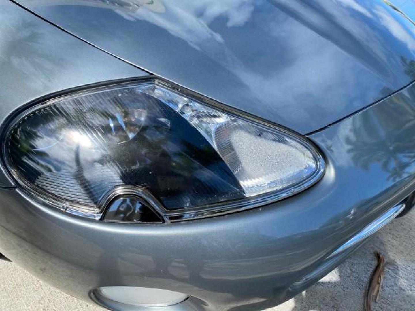 2003 Quartz /Dove Jaguar XK8 1 OWNER LOW MILES 37,004 (SAJDA42C132) with an 4.2L DOHC EFI 32-Valve Aluminum Alloy V8 Engine engine, Automatic transmission, located at 4701 North Dixie Hwy, Pompano Beach, FL, 33064, (954) 422-2889, 26.240938, -80.123474 - OUR WEBPAGE FLORIDACARS1.COM HAS OVER 100 PHOTOS AND FREE CARFAX LINK 2003 JAGUAR XK-SERIES XK8 $ 79,405 NEW ! VIN: SAJDA42C132A31624 S A J D A 4 2 C 1 3 2 A 3 1 6 2 4 CONVERTIBLE BOOT INCLUDED 4.2L V8 F DOHC GASOLINE REAR WHEEL DRIVE Top Features Alloy Wheels Leather Seats Alpine Sound System Navig - Photo#98