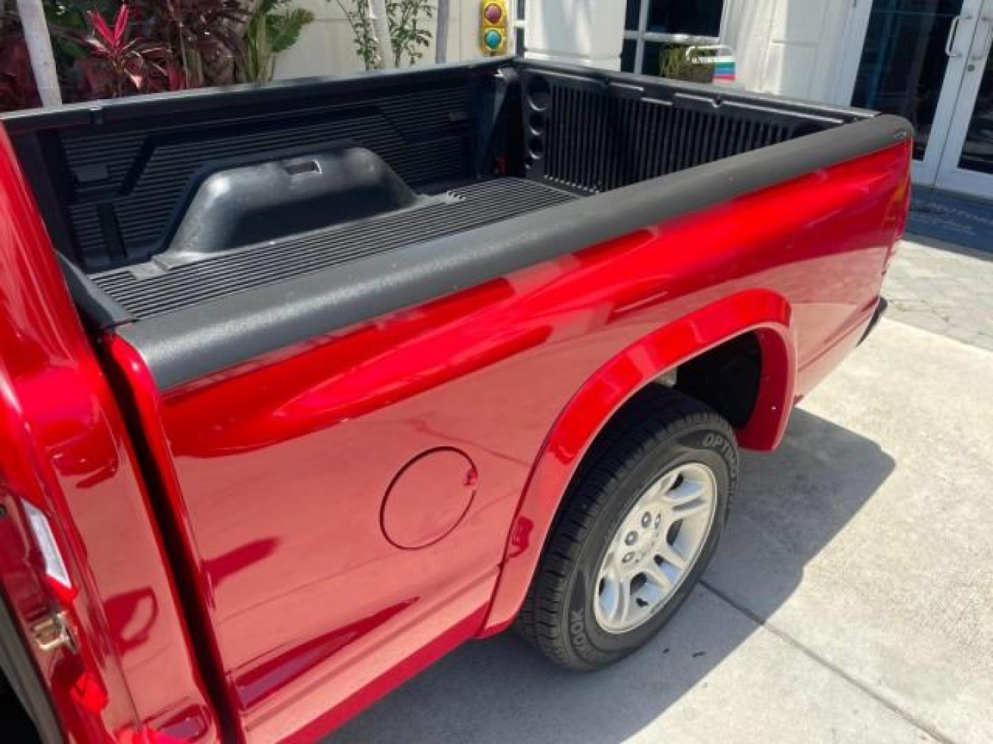 2003 Flame Red /Dark Slate Gray Dodge Dakota SXT FL OWNER LOW MILES 43,924 5 SPD (1D7FL16X43S) with an 3.9L V6 Cylinder Engine engine, Manual transmission, located at 4701 North Dixie Hwy, Pompano Beach, FL, 33064, (954) 422-2889, 26.240938, -80.123474 - OUR WEBPAGE FLORIDACARS1.COM HAS OVER 100 PHOTOS AND FREE CARFAX LINK 2003 DODGE DAKOTA VIN: 1D7FL16X43S306371 1 D 7 F L 1 6 X 4 3 S 3 0 6 3 7 1 PICKUP 75 INCH BED 3.9L V6 F OHV GASOLINE REAR WHEEL DRIVE Top Features Alloy Wheels Cloth Seats [-RETX] SXT QUICK-ORDER PKG SAVINGS *DISCOUNT* ($-1420.00) - Photo#12