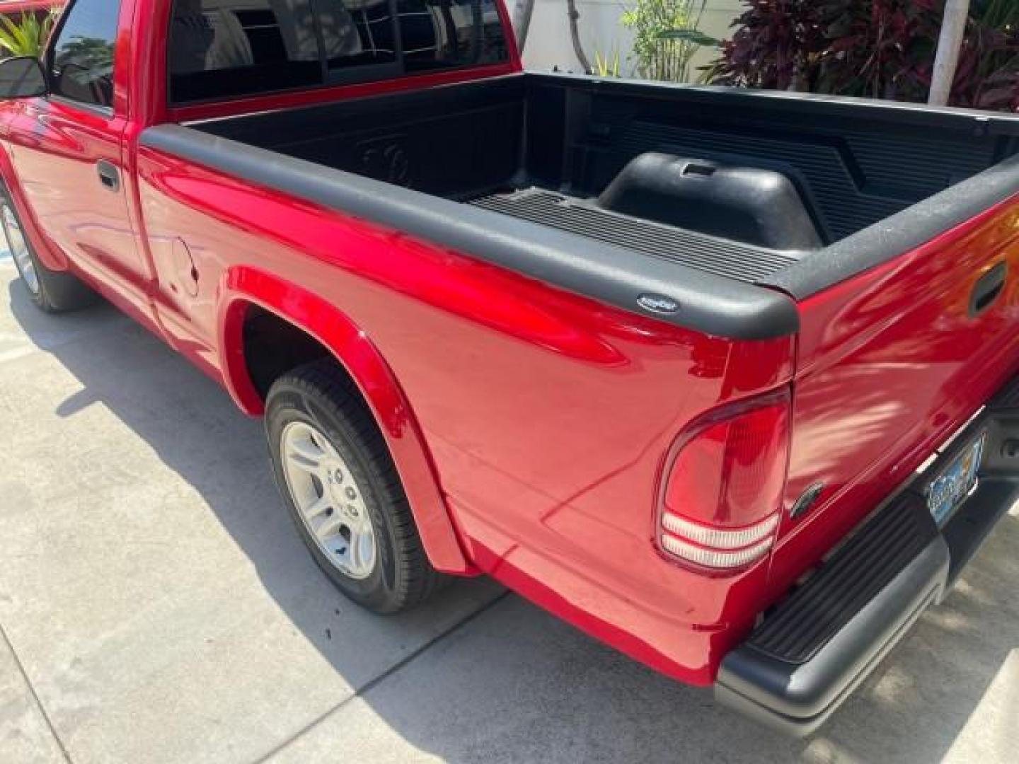 2003 Flame Red /Dark Slate Gray Dodge Dakota SXT FL OWNER LOW MILES 43,924 5 SPD (1D7FL16X43S) with an 3.9L V6 Cylinder Engine engine, Manual transmission, located at 4701 North Dixie Hwy, Pompano Beach, FL, 33064, (954) 422-2889, 26.240938, -80.123474 - OUR WEBPAGE FLORIDACARS1.COM HAS OVER 100 PHOTOS AND FREE CARFAX LINK 2003 DODGE DAKOTA VIN: 1D7FL16X43S306371 1 D 7 F L 1 6 X 4 3 S 3 0 6 3 7 1 PICKUP 75 INCH BED 3.9L V6 F OHV GASOLINE REAR WHEEL DRIVE Top Features Alloy Wheels Cloth Seats [-RETX] SXT QUICK-ORDER PKG SAVINGS *DISCOUNT* ($-1420.00) - Photo#14