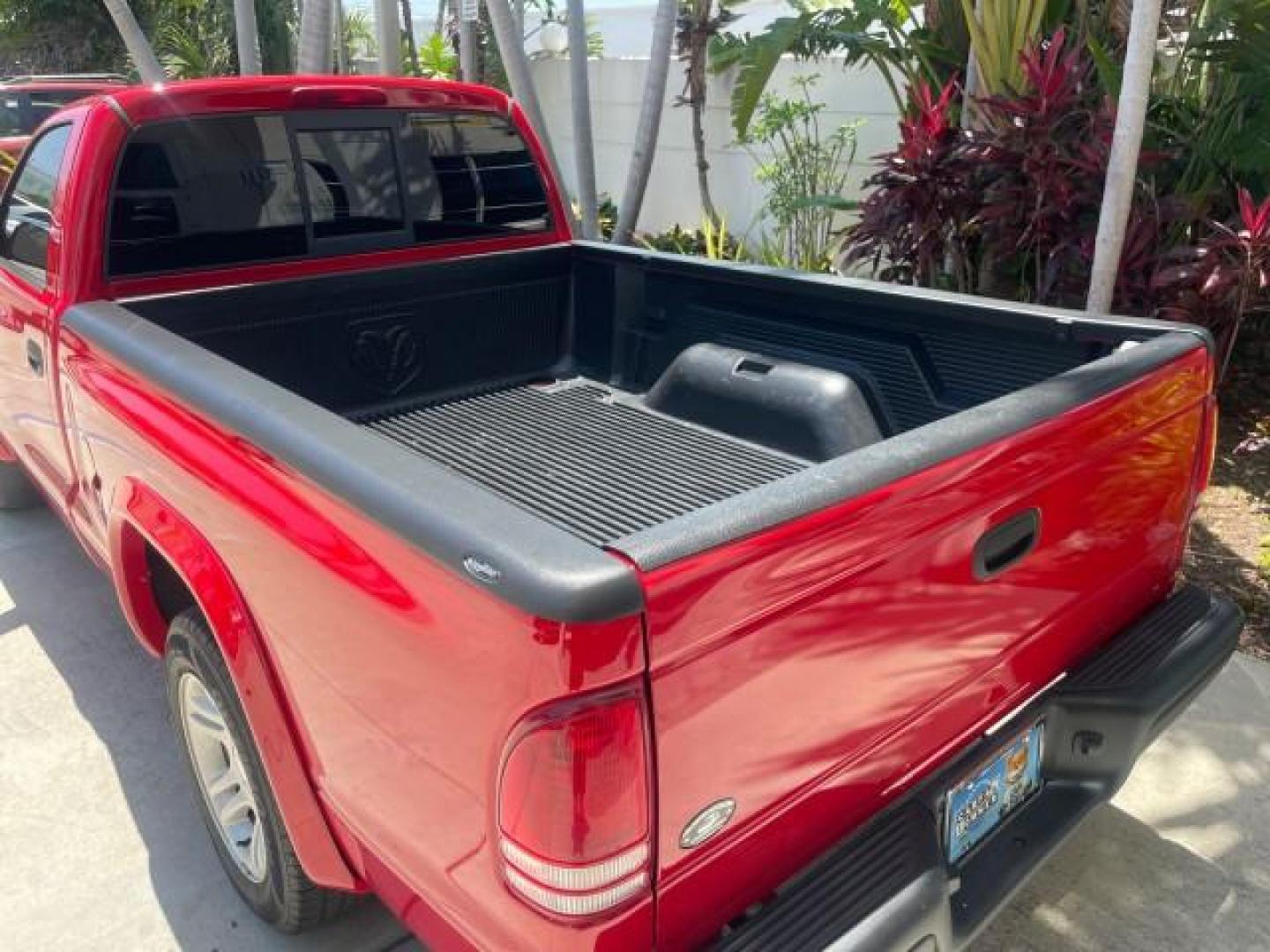 2003 Flame Red /Dark Slate Gray Dodge Dakota SXT FL OWNER LOW MILES 43,924 5 SPD (1D7FL16X43S) with an 3.9L V6 Cylinder Engine engine, Manual transmission, located at 4701 North Dixie Hwy, Pompano Beach, FL, 33064, (954) 422-2889, 26.240938, -80.123474 - OUR WEBPAGE FLORIDACARS1.COM HAS OVER 100 PHOTOS AND FREE CARFAX LINK 2003 DODGE DAKOTA VIN: 1D7FL16X43S306371 1 D 7 F L 1 6 X 4 3 S 3 0 6 3 7 1 PICKUP 75 INCH BED 3.9L V6 F OHV GASOLINE REAR WHEEL DRIVE Top Features Alloy Wheels Cloth Seats [-RETX] SXT QUICK-ORDER PKG SAVINGS *DISCOUNT* ($-1420.00) - Photo#63