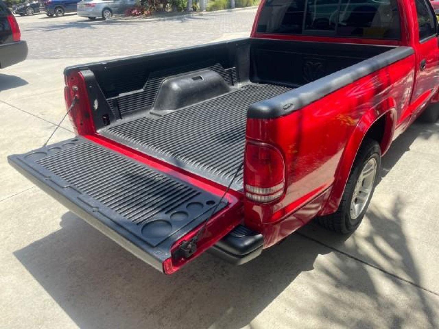 2003 Flame Red /Dark Slate Gray Dodge Dakota SXT FL OWNER LOW MILES 43,924 5 SPD (1D7FL16X43S) with an 3.9L V6 Cylinder Engine engine, Manual transmission, located at 4701 North Dixie Hwy, Pompano Beach, FL, 33064, (954) 422-2889, 26.240938, -80.123474 - OUR WEBPAGE FLORIDACARS1.COM HAS OVER 100 PHOTOS AND FREE CARFAX LINK 2003 DODGE DAKOTA VIN: 1D7FL16X43S306371 1 D 7 F L 1 6 X 4 3 S 3 0 6 3 7 1 PICKUP 75 INCH BED 3.9L V6 F OHV GASOLINE REAR WHEEL DRIVE Top Features Alloy Wheels Cloth Seats [-RETX] SXT QUICK-ORDER PKG SAVINGS *DISCOUNT* ($-1420.00) - Photo#68