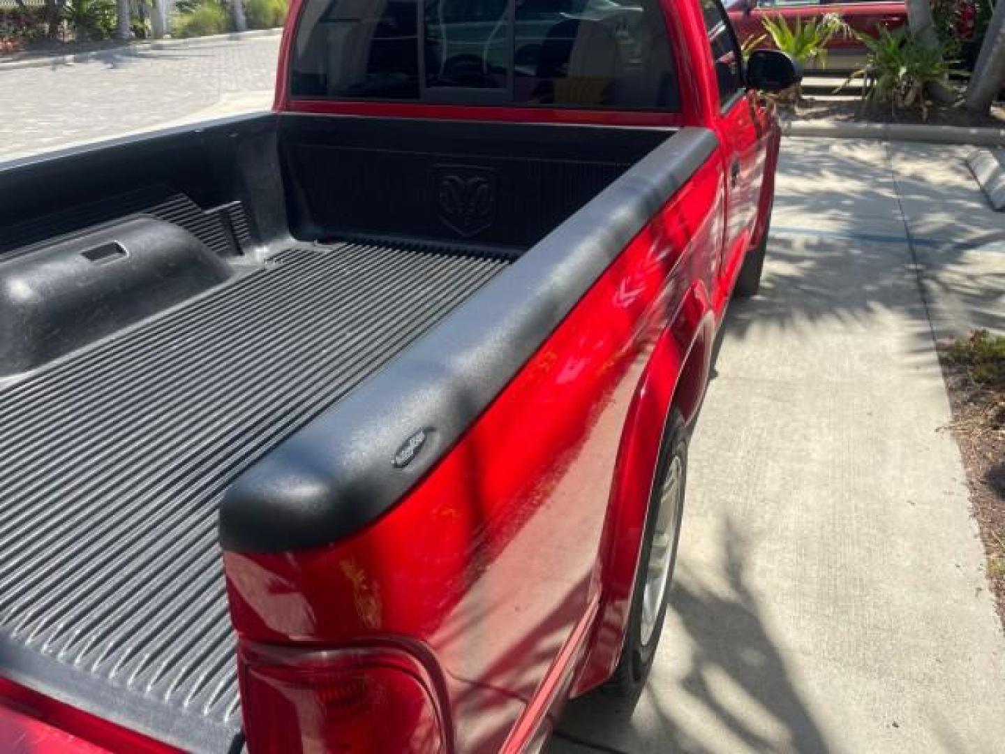 2003 Flame Red /Dark Slate Gray Dodge Dakota SXT FL OWNER LOW MILES 43,924 5 SPD (1D7FL16X43S) with an 3.9L V6 Cylinder Engine engine, Manual transmission, located at 4701 North Dixie Hwy, Pompano Beach, FL, 33064, (954) 422-2889, 26.240938, -80.123474 - OUR WEBPAGE FLORIDACARS1.COM HAS OVER 100 PHOTOS AND FREE CARFAX LINK 2003 DODGE DAKOTA VIN: 1D7FL16X43S306371 1 D 7 F L 1 6 X 4 3 S 3 0 6 3 7 1 PICKUP 75 INCH BED 3.9L V6 F OHV GASOLINE REAR WHEEL DRIVE Top Features Alloy Wheels Cloth Seats [-RETX] SXT QUICK-ORDER PKG SAVINGS *DISCOUNT* ($-1420.00) - Photo#69
