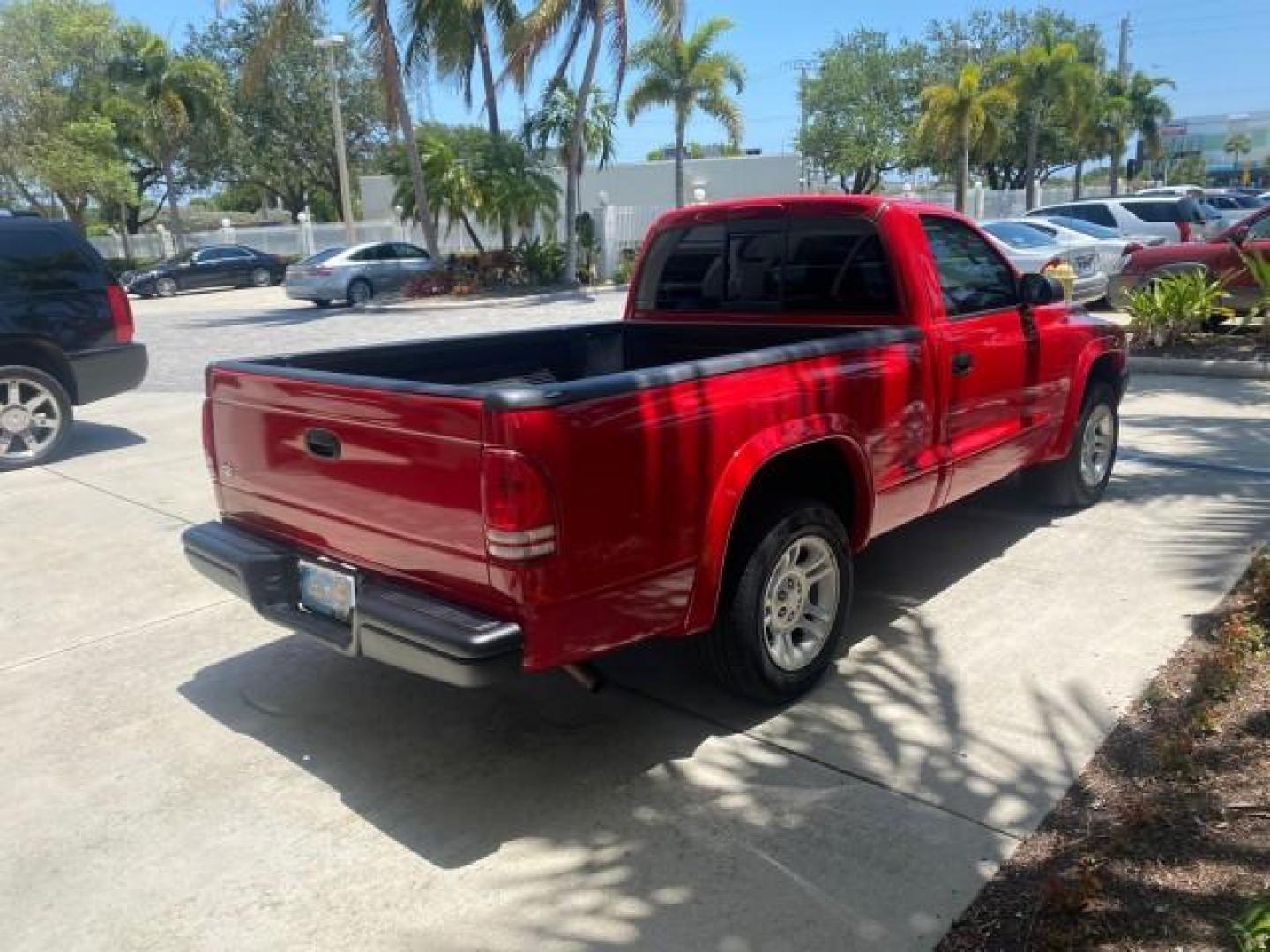 2003 Flame Red /Dark Slate Gray Dodge Dakota SXT FL OWNER LOW MILES 43,924 5 SPD (1D7FL16X43S) with an 3.9L V6 Cylinder Engine engine, Manual transmission, located at 4701 North Dixie Hwy, Pompano Beach, FL, 33064, (954) 422-2889, 26.240938, -80.123474 - OUR WEBPAGE FLORIDACARS1.COM HAS OVER 100 PHOTOS AND FREE CARFAX LINK 2003 DODGE DAKOTA VIN: 1D7FL16X43S306371 1 D 7 F L 1 6 X 4 3 S 3 0 6 3 7 1 PICKUP 75 INCH BED 3.9L V6 F OHV GASOLINE REAR WHEEL DRIVE Top Features Alloy Wheels Cloth Seats [-RETX] SXT QUICK-ORDER PKG SAVINGS *DISCOUNT* ($-1420.00) - Photo#7