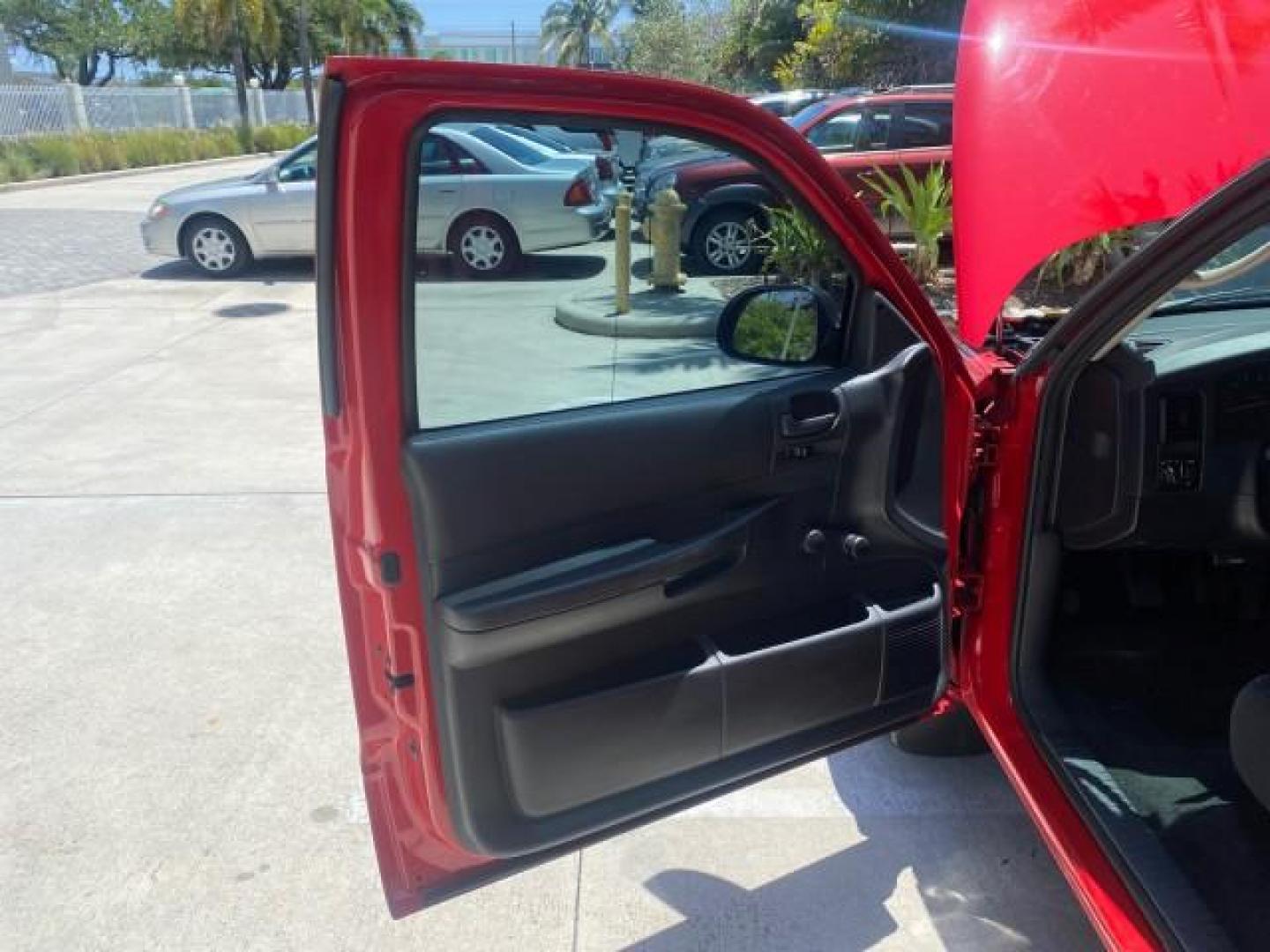 2003 Flame Red /Dark Slate Gray Dodge Dakota SXT FL OWNER LOW MILES 43,924 5 SPD (1D7FL16X43S) with an 3.9L V6 Cylinder Engine engine, Manual transmission, located at 4701 North Dixie Hwy, Pompano Beach, FL, 33064, (954) 422-2889, 26.240938, -80.123474 - OUR WEBPAGE FLORIDACARS1.COM HAS OVER 100 PHOTOS AND FREE CARFAX LINK 2003 DODGE DAKOTA VIN: 1D7FL16X43S306371 1 D 7 F L 1 6 X 4 3 S 3 0 6 3 7 1 PICKUP 75 INCH BED 3.9L V6 F OHV GASOLINE REAR WHEEL DRIVE Top Features Alloy Wheels Cloth Seats [-RETX] SXT QUICK-ORDER PKG SAVINGS *DISCOUNT* ($-1420.00) - Photo#9