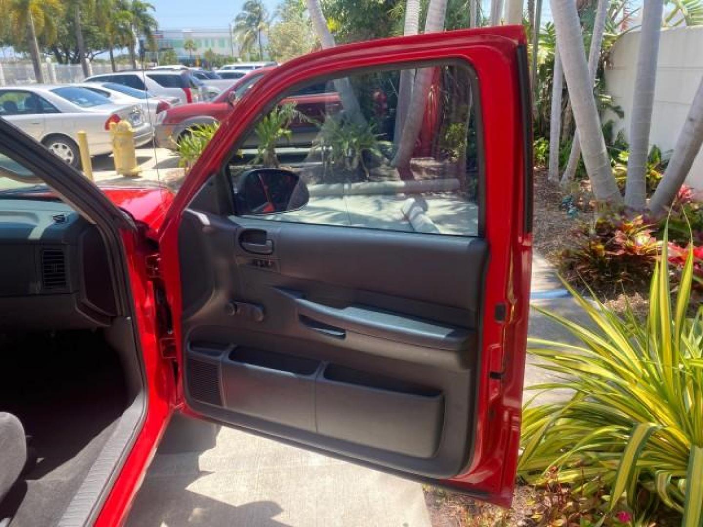 2003 Flame Red /Dark Slate Gray Dodge Dakota SXT FL OWNER LOW MILES 43,924 5 SPD (1D7FL16X43S) with an 3.9L V6 Cylinder Engine engine, Manual transmission, located at 4701 North Dixie Hwy, Pompano Beach, FL, 33064, (954) 422-2889, 26.240938, -80.123474 - OUR WEBPAGE FLORIDACARS1.COM HAS OVER 100 PHOTOS AND FREE CARFAX LINK 2003 DODGE DAKOTA VIN: 1D7FL16X43S306371 1 D 7 F L 1 6 X 4 3 S 3 0 6 3 7 1 PICKUP 75 INCH BED 3.9L V6 F OHV GASOLINE REAR WHEEL DRIVE Top Features Alloy Wheels Cloth Seats [-RETX] SXT QUICK-ORDER PKG SAVINGS *DISCOUNT* ($-1420.00) - Photo#11