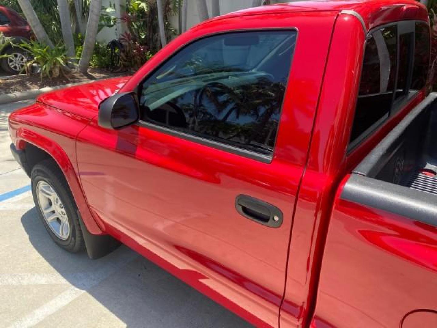 2003 Flame Red /Dark Slate Gray Dodge Dakota SXT FL OWNER LOW MILES 43,924 5 SPD (1D7FL16X43S) with an 3.9L V6 Cylinder Engine engine, Manual transmission, located at 4701 North Dixie Hwy, Pompano Beach, FL, 33064, (954) 422-2889, 26.240938, -80.123474 - OUR WEBPAGE FLORIDACARS1.COM HAS OVER 100 PHOTOS AND FREE CARFAX LINK 2003 DODGE DAKOTA VIN: 1D7FL16X43S306371 1 D 7 F L 1 6 X 4 3 S 3 0 6 3 7 1 PICKUP 75 INCH BED 3.9L V6 F OHV GASOLINE REAR WHEEL DRIVE Top Features Alloy Wheels Cloth Seats [-RETX] SXT QUICK-ORDER PKG SAVINGS *DISCOUNT* ($-1420.00) - Photo#28